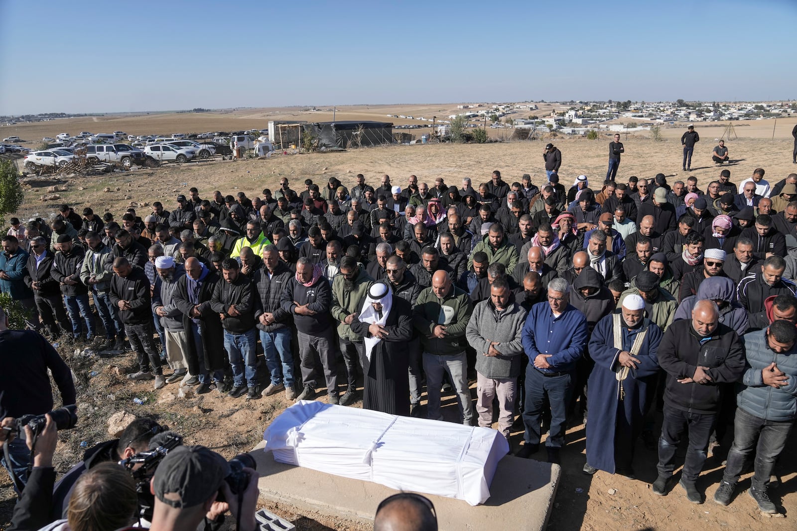 Members of the Bedouin community, part of Israel's Palestinian minority who have Israeli citizenship, attend the funeral of Yosef Al Zaydani in Rahat, southern Israel, Thursday, Jan. 9, 2025 after the Israeli military said his body of was recovered in an underground tunnel in southern Gaza Strip. (AP Photo/Mahmoud Illean)