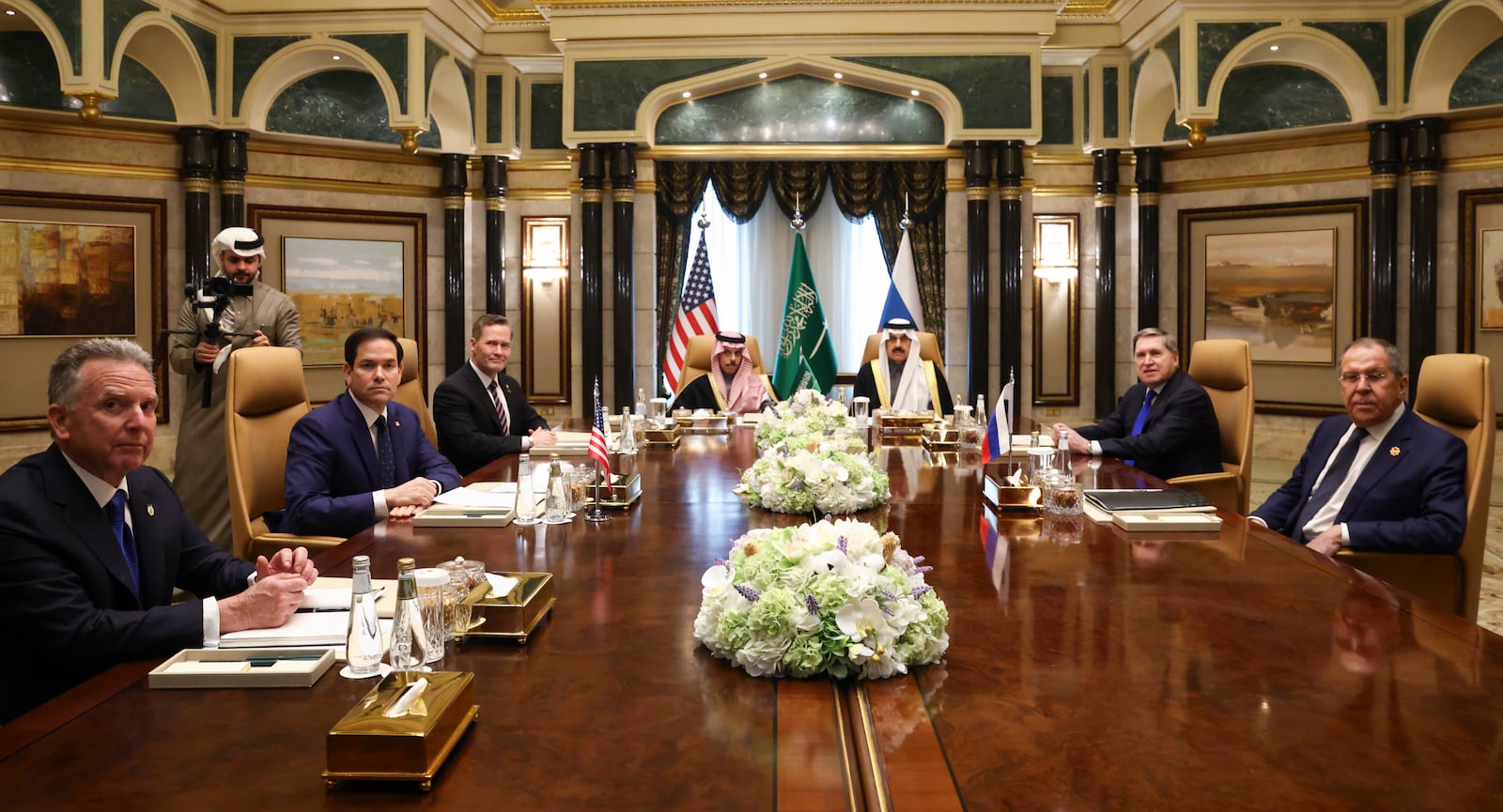 U.S. Secretary of State Marco Rubio, second left, meets with Saudi Foreign Minister Prince Faisal bin Farhan Al Saud, Saudi National Security Advisor Mosaad bin Mohammad Al-Aiban, U.S. National Security Advisor Mike Waltz, third left, U.S. Middle East envoy Steve Witkoff, left, Russian Foreign Minister Sergei Lavrov, right, and Russian President Vladimir Putin's foreign policy advisor Yuri Ushakov, second right, at Diriyah Palace, in Riyadh, Saudi Arabia, Tuesday Feb. 18, 2025. (Evelyn Hockstein/Pool Photo via AP)