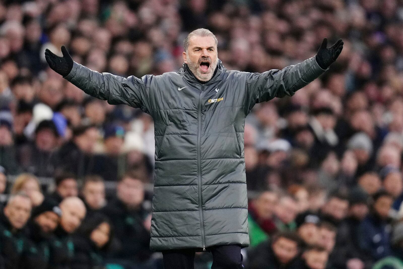 Tottenham Hotspur manager Ange Postecoglou gestures on the touchline during the English Premier League soccer match between Tottenham Hotspur and Wolverhampton Wanderers in London, England, Sunday, Dec. 29, 2024. (John Walton/PA via AP)