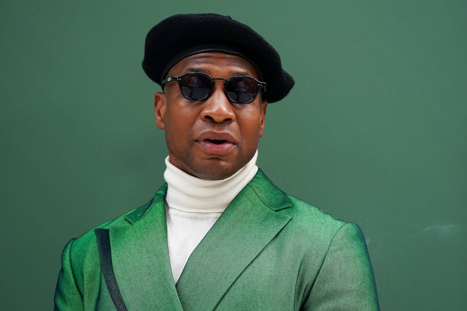 Jonathan Majors arrives at the Essence Black Women in Hollywood Awards on Thursday, Feb. 27, 2025, in Los Angeles. (Photo by Jordan Strauss/Invision/AP)