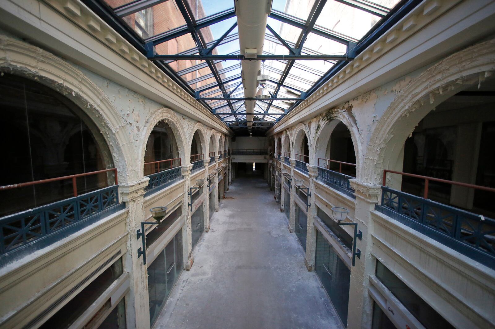 A two-story interior section of the Third Street Dayton Arcade. The city of Dayton Friday pulled a request for $1 million in Montgomery County ED/GE funding to redevelop the arcade — but another funding request is expected in the spring. TY GREENLEES / STAFF