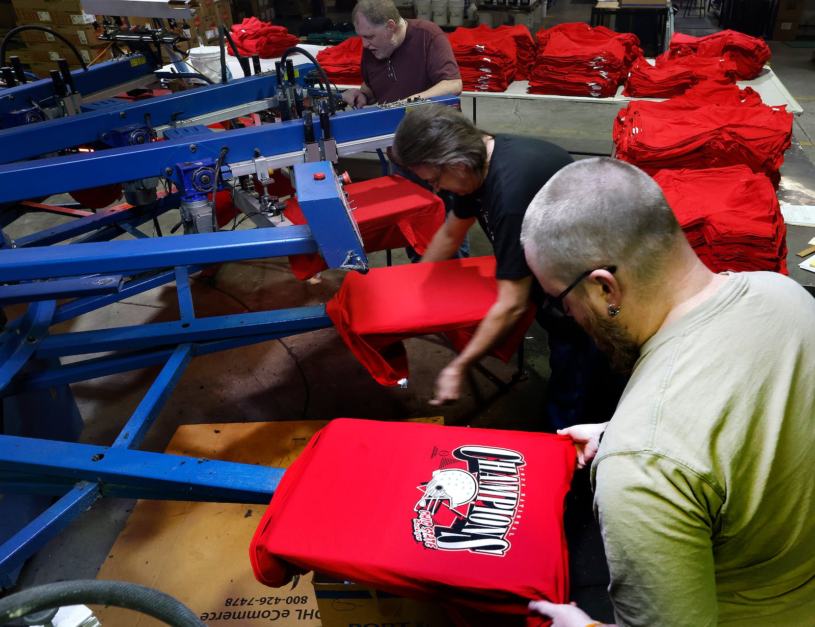 Titan Graphics will had three shifts working around the clock Tuesday, January 21, 2025 printing Ohio State national champions T-shirts. MARSHALL GORBY \STAFF