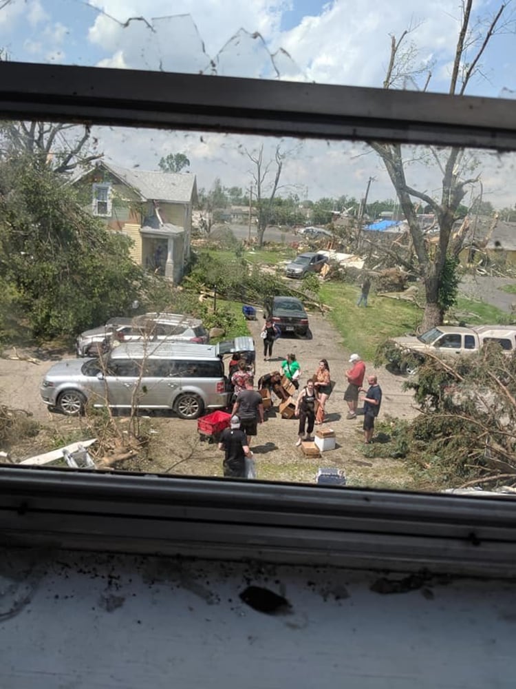 Photos: Community rallies around Dayton restaurant owner after son’s death, tornado