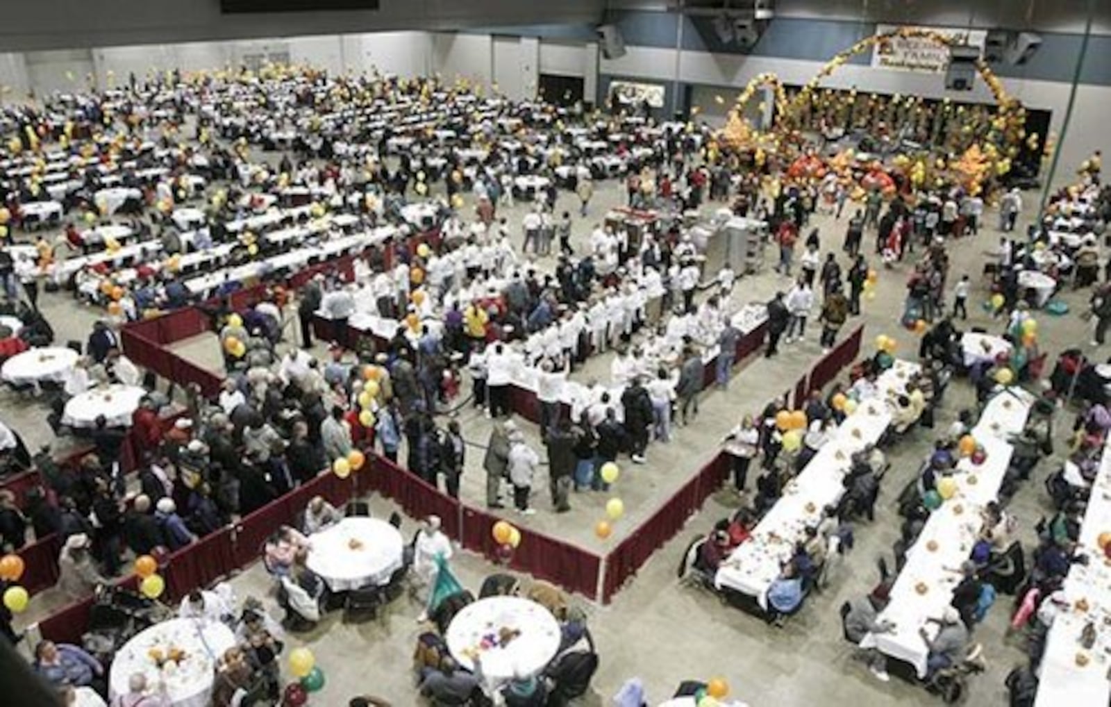 Thousands of people attended the annual Beerman Family Thanksgiving Day Dinner Thursday Nov. 27 at the Dayton Convention Center. Cooks prepared 1,200 pounds of turkey and trimmings for the Dayton tradition which began 40 years ago.