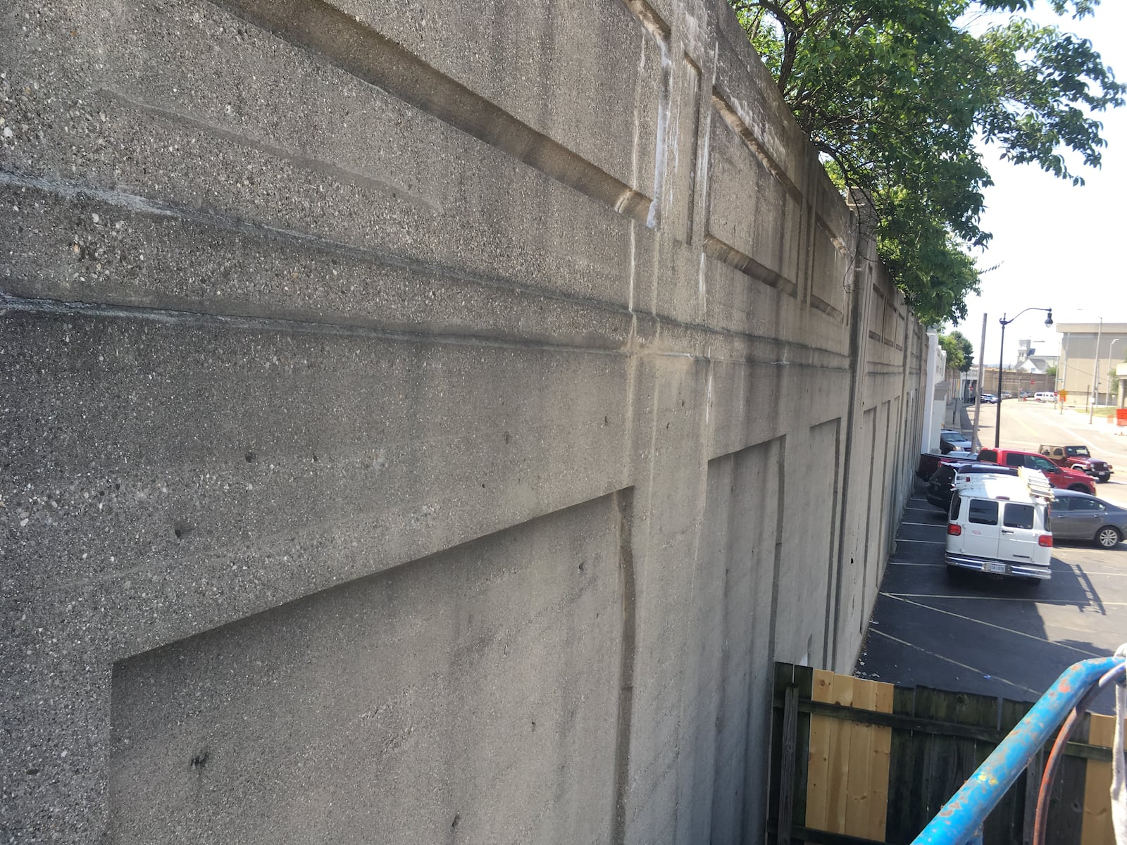 Brian Ferguson, the owner of Zada Paint Works, painted the base coat of the wall at the entrance of the Oregon District. A mural is now being painted on the wall.  This photo was taken before paint was applied.