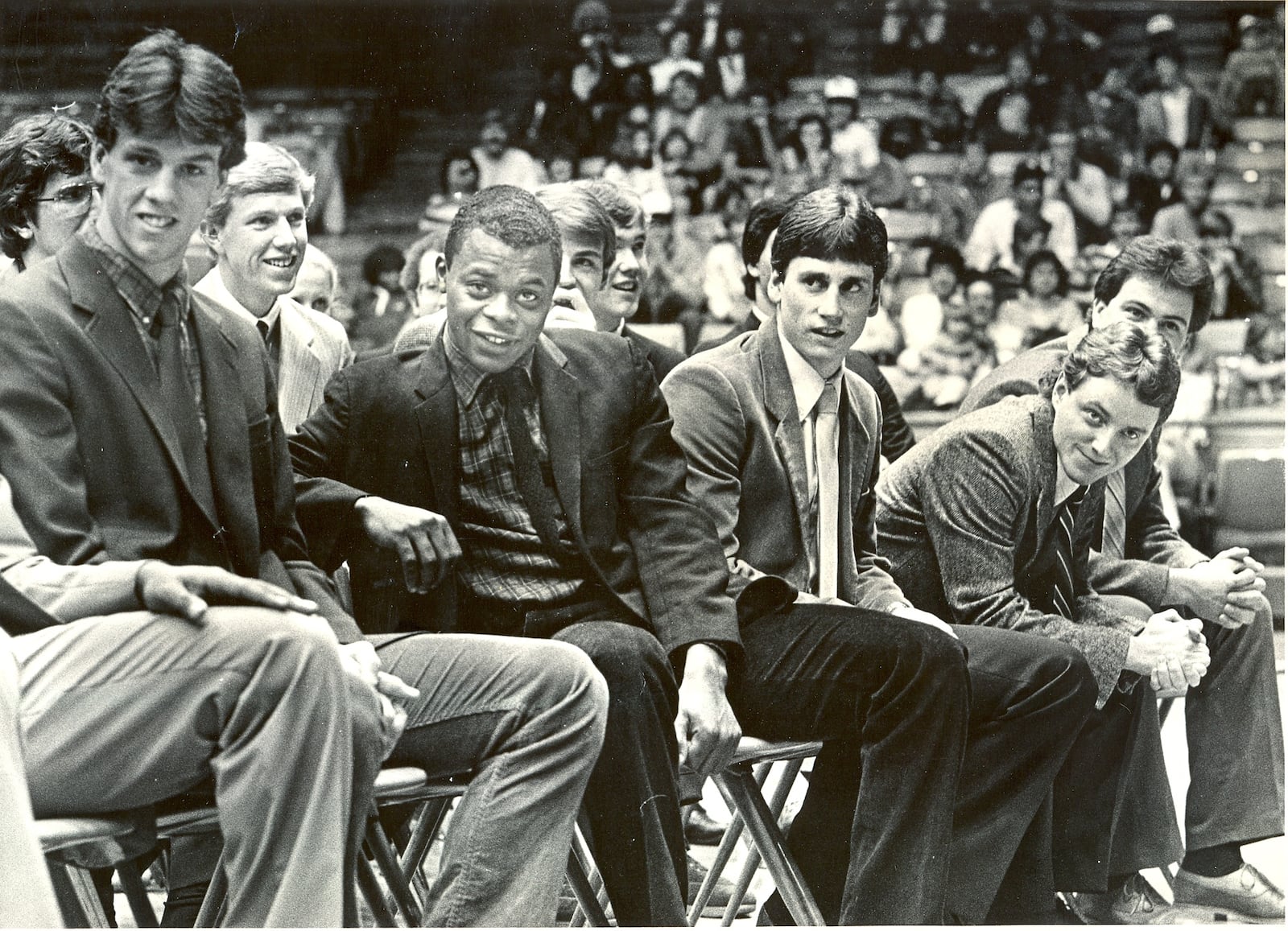 UD Flyers (from left) Larry Schellenberg, Rory Dahlinghaus, Cedric Toney and Dan Christie sit in UD Arena before a crowd of more than 3,000 gathered to celebrate the Flyers' NCAA tournament success.