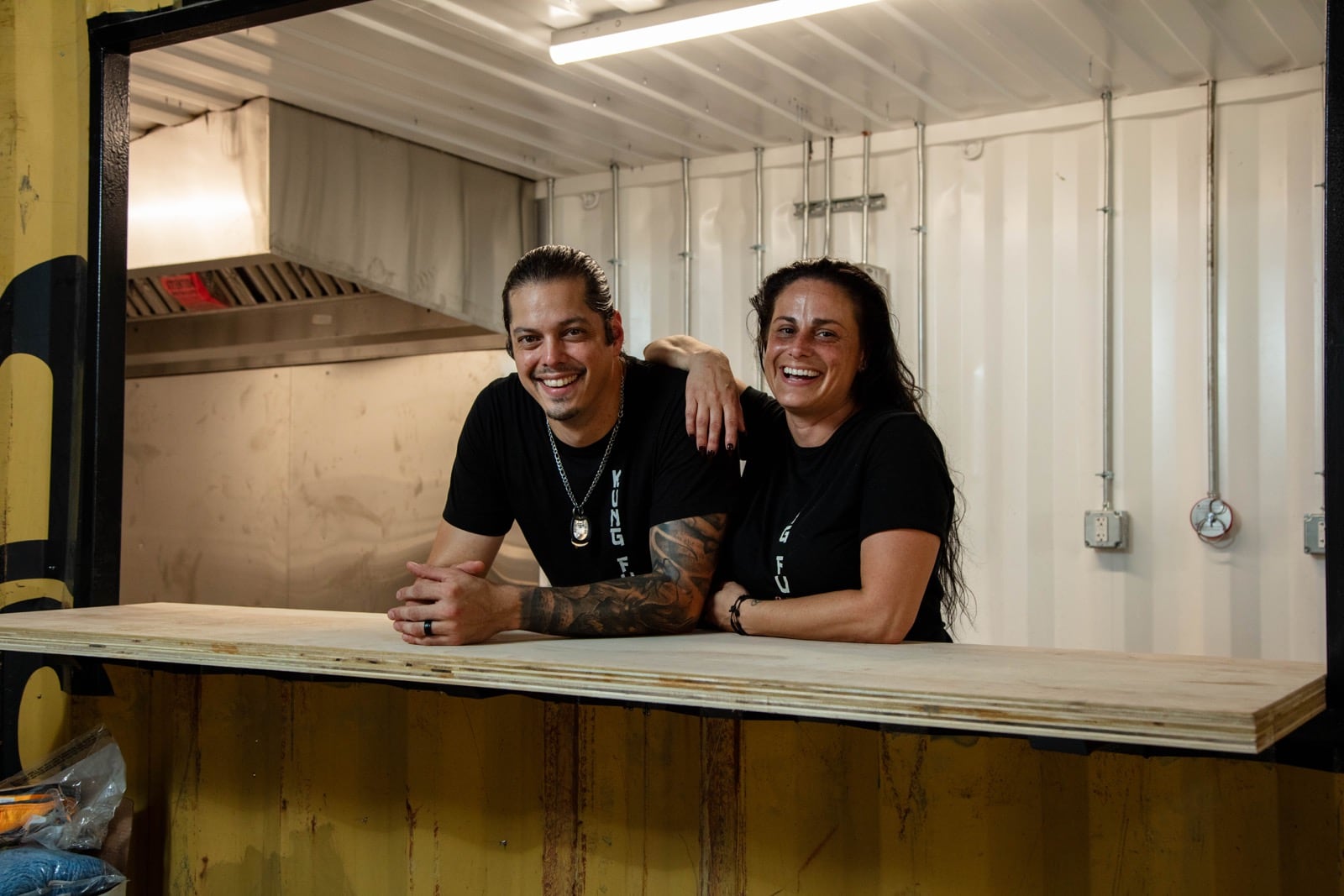 KungFu BBQ will serve worldly-inspired cuisine with a unique smoked interpretation at The Silos, a new food hall and beer garden expected to open in the fall near 2nd Street Market in downtown Dayton. Pictured are owners Nate and Marie Lansangan (CONTRIBUTED PHOTO).