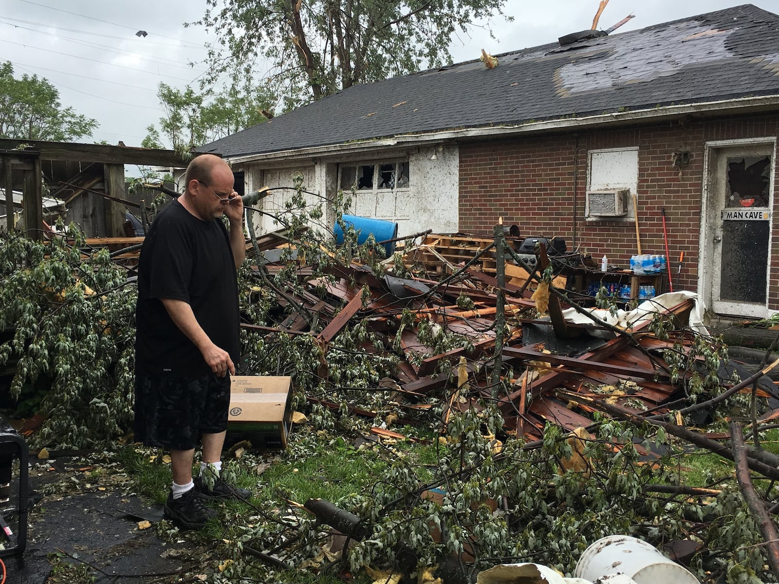 Joe Guth, 45, raised his two children on the same block of Troy Street where he spent his own childhood. But in 30 seconds, a violent tornado ripped apart his home. “Every minute, it sinks in more and more. It’s like a movie.”