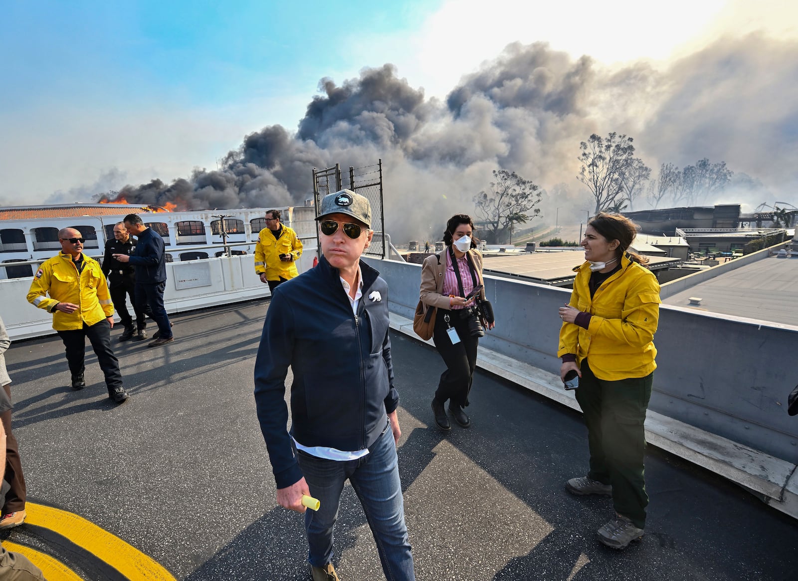 California Governor Gavin Newsom surveys damage in during the Palisades Fire on Wednesday, Jan. 8, 2025, in Pacific Palisades, Calif. (Jeff Gritchen/The Orange County Register via AP)