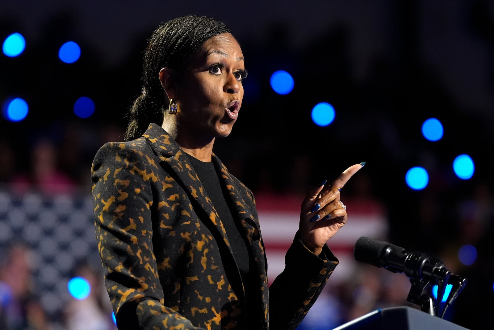 Former first lady Michelle Obama speaks at a campaign rally for democratic presidential nominee Vice President Kamala Harris at the Wings Event Center, in Kalamazoo, Mich., Saturday, Oct. 26, 2024.(AP Photo/Jacquelyn Martin)