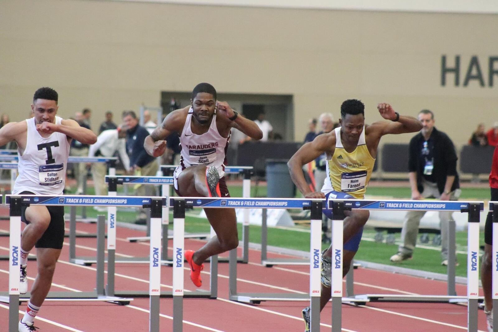 Central State’s Juan Scott (Center) competes in the 60 hurdles at last year’s NCAA Championships. CONTRIBUTED