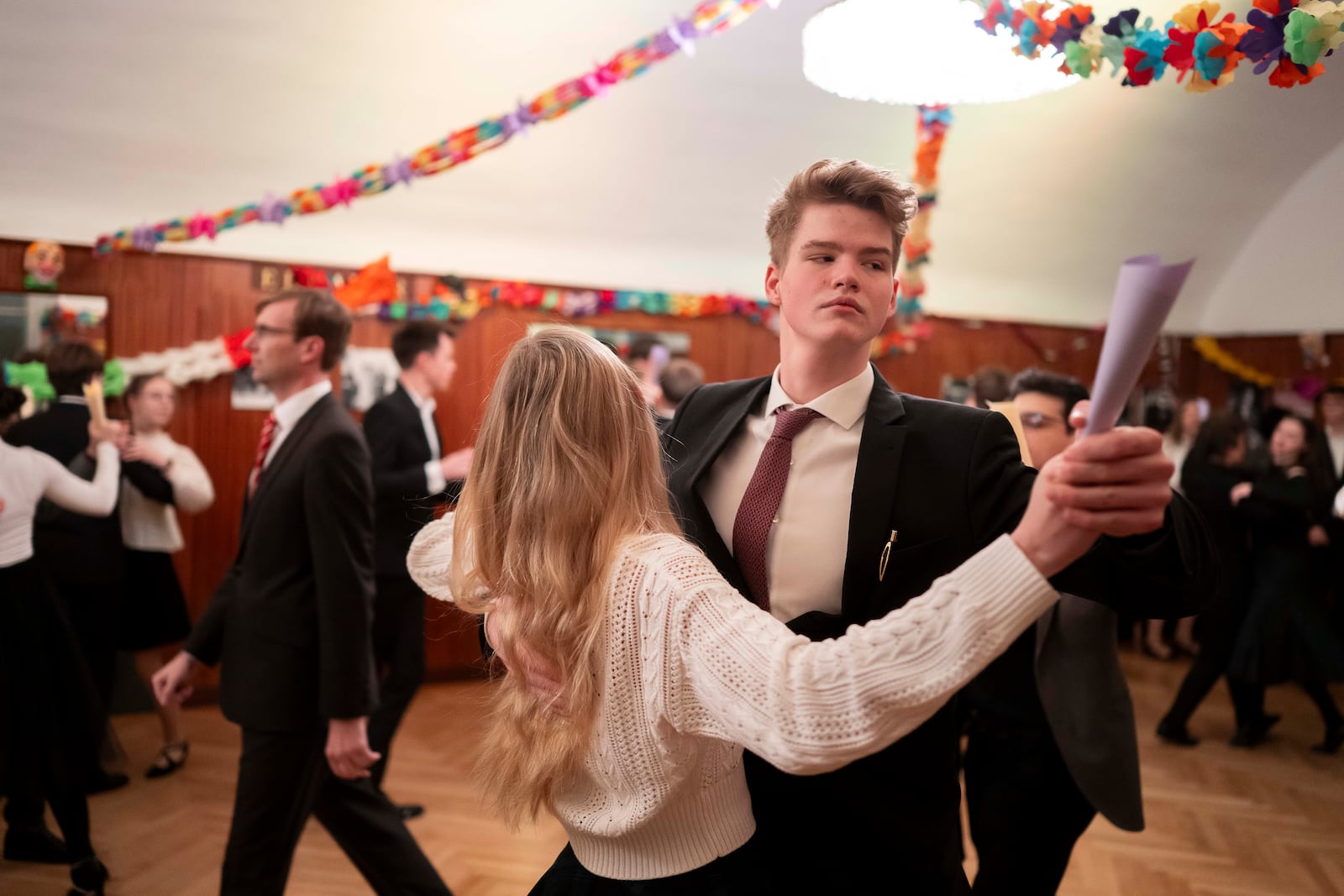 Young people learn to dance waltz during a rehearsal in the Elmayer Dance School in Vienna, Austria, Sunday, Febr 23, 2025. (AP Photo/Denes Erdos)