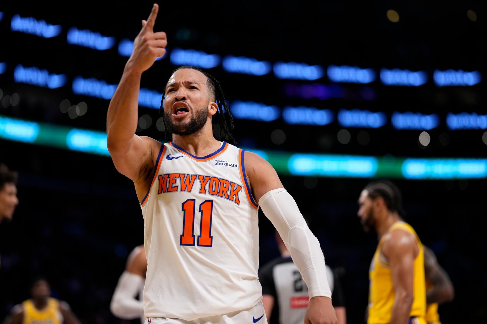 New York Knicks guard Jalen Brunson gestures after scoring during the second half of an NBA basketball game against the Los Angeles Lakers Thursday, March 6, 2025, in Los Angeles. (AP Photo/Mark J. Terrill)