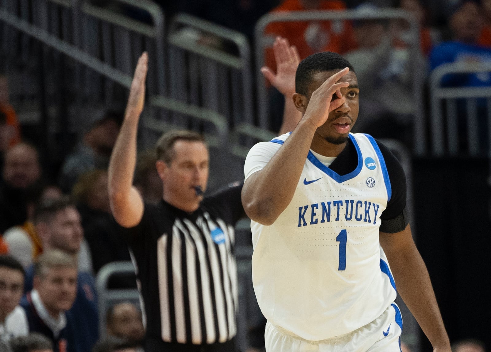 Kentucky guard Lamont Butler (1) reacts against Illinois in the second round of the NCAA college basketball tournament Sunday, March 23, 2025, in Milwaukee. (AP Photo/Jeffrey Phelps)