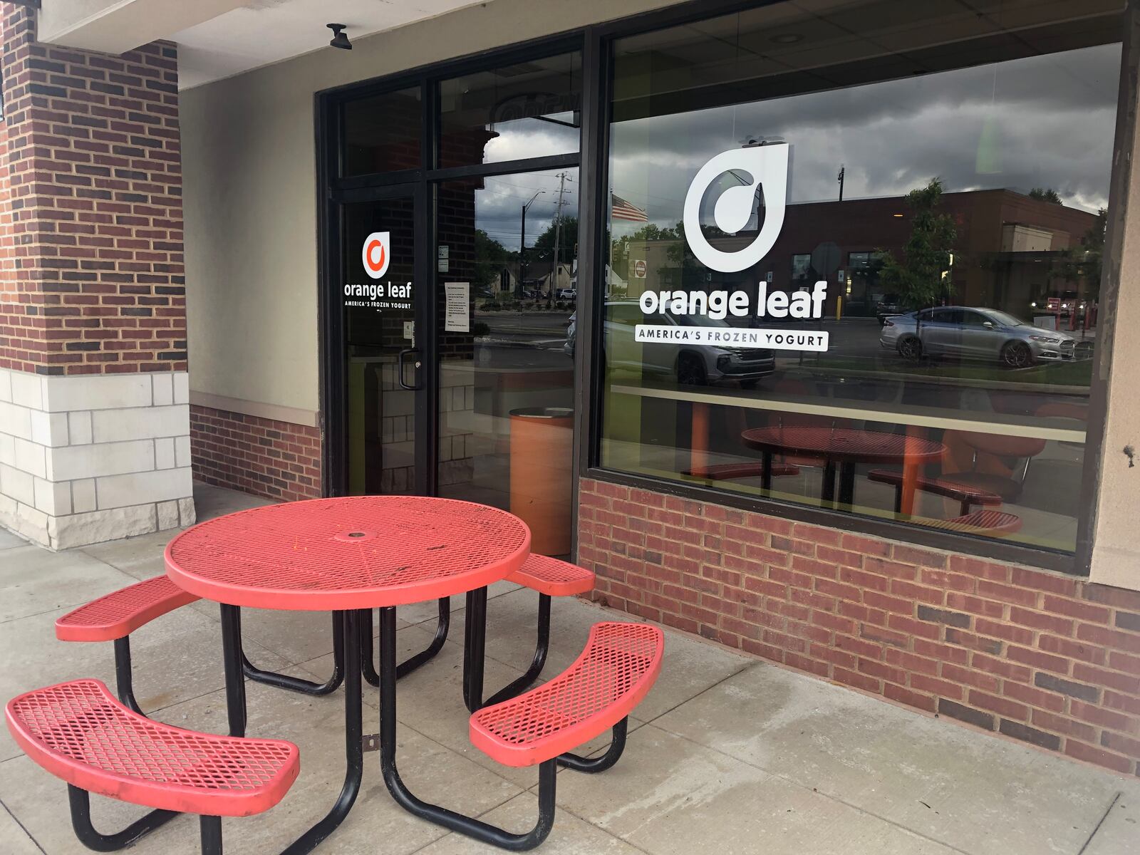 The Orange Leaf frozen yogurt shop in Kettering's Town & Country shopping center closed in late August 2022. JEREMY P. KELLEY / STAFF