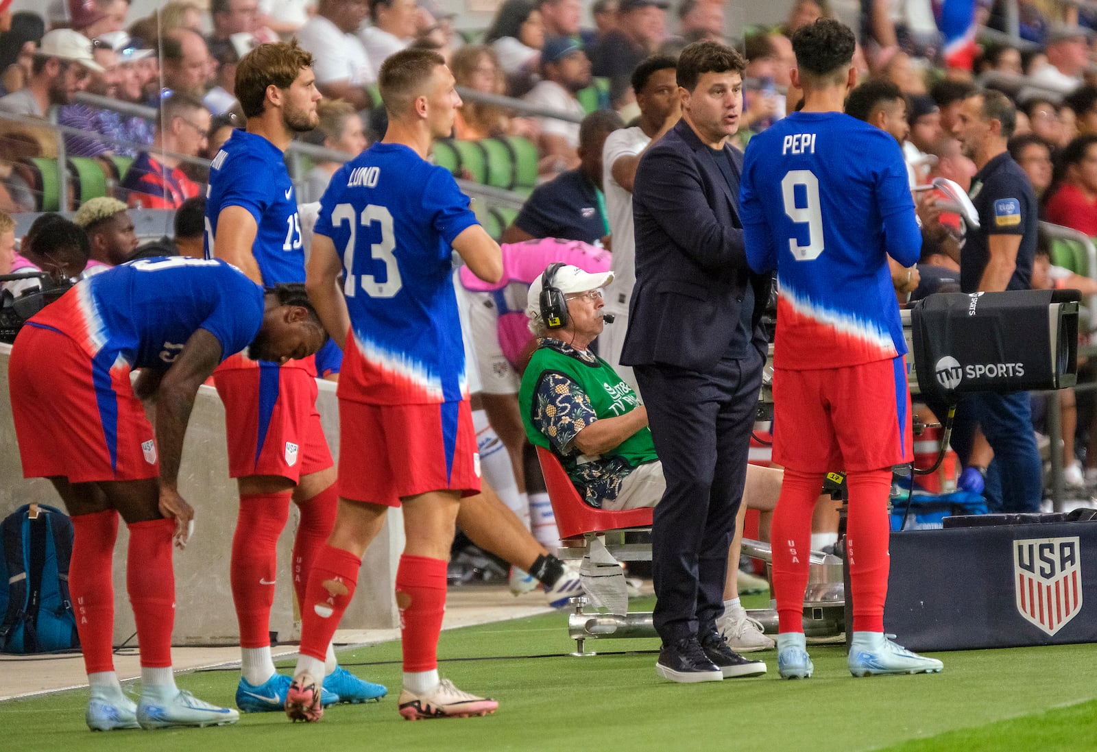 United States head coach, Mauricio Pochettino, speaks with forward, Ricardo Pepi, (9), before a substitution against Panama during the second half of a international friendly soccer match, Saturday, Oct. 12, 2024, in Austin, Texas. (AP Photo/Rodolfo Gonzalez)