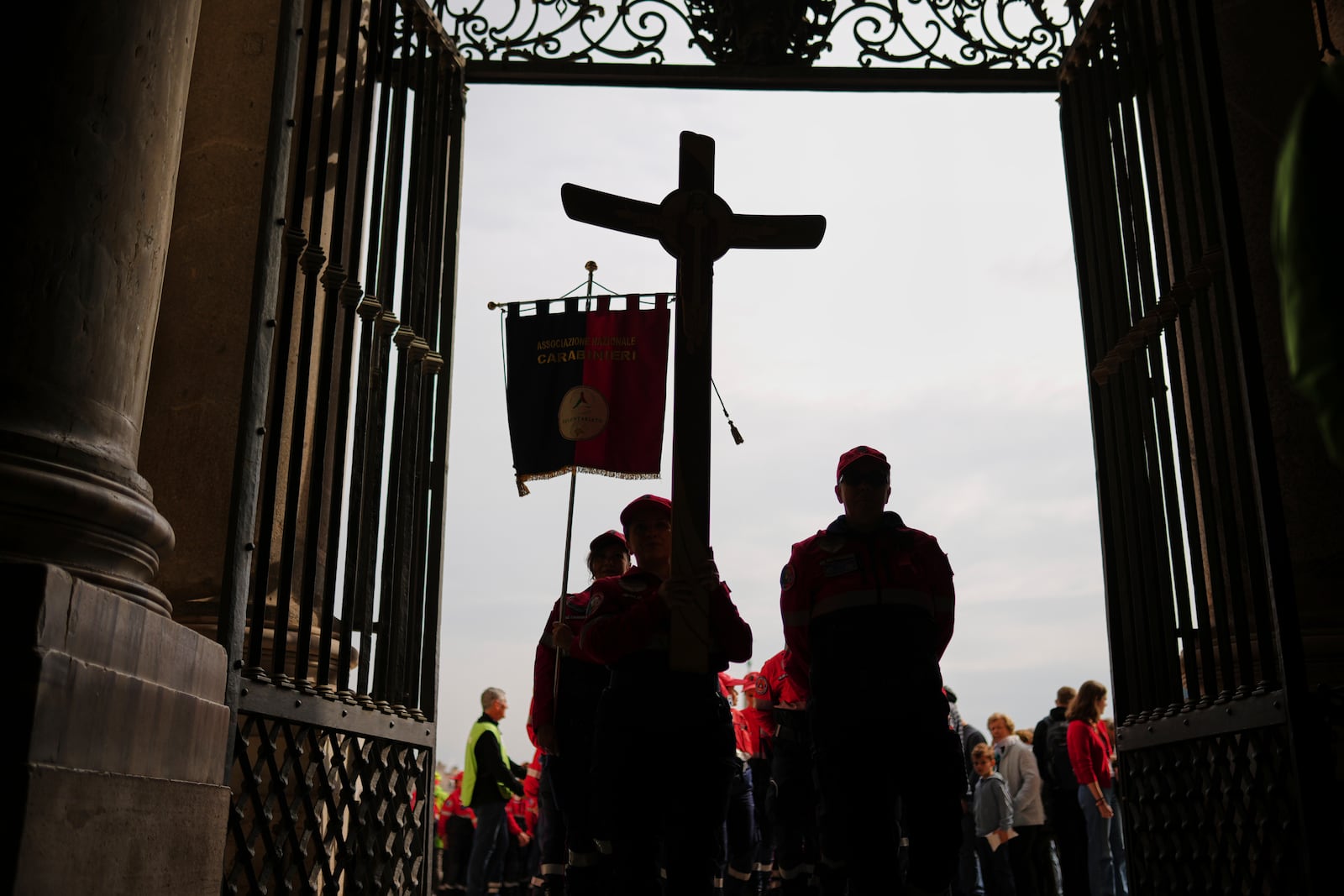 Italian Carabinieri civil protection volunteers arrive to St. Peter's Basilica at The Vatican, Saturday, March 8, 2025. (AP Photo/Francisco Seco)