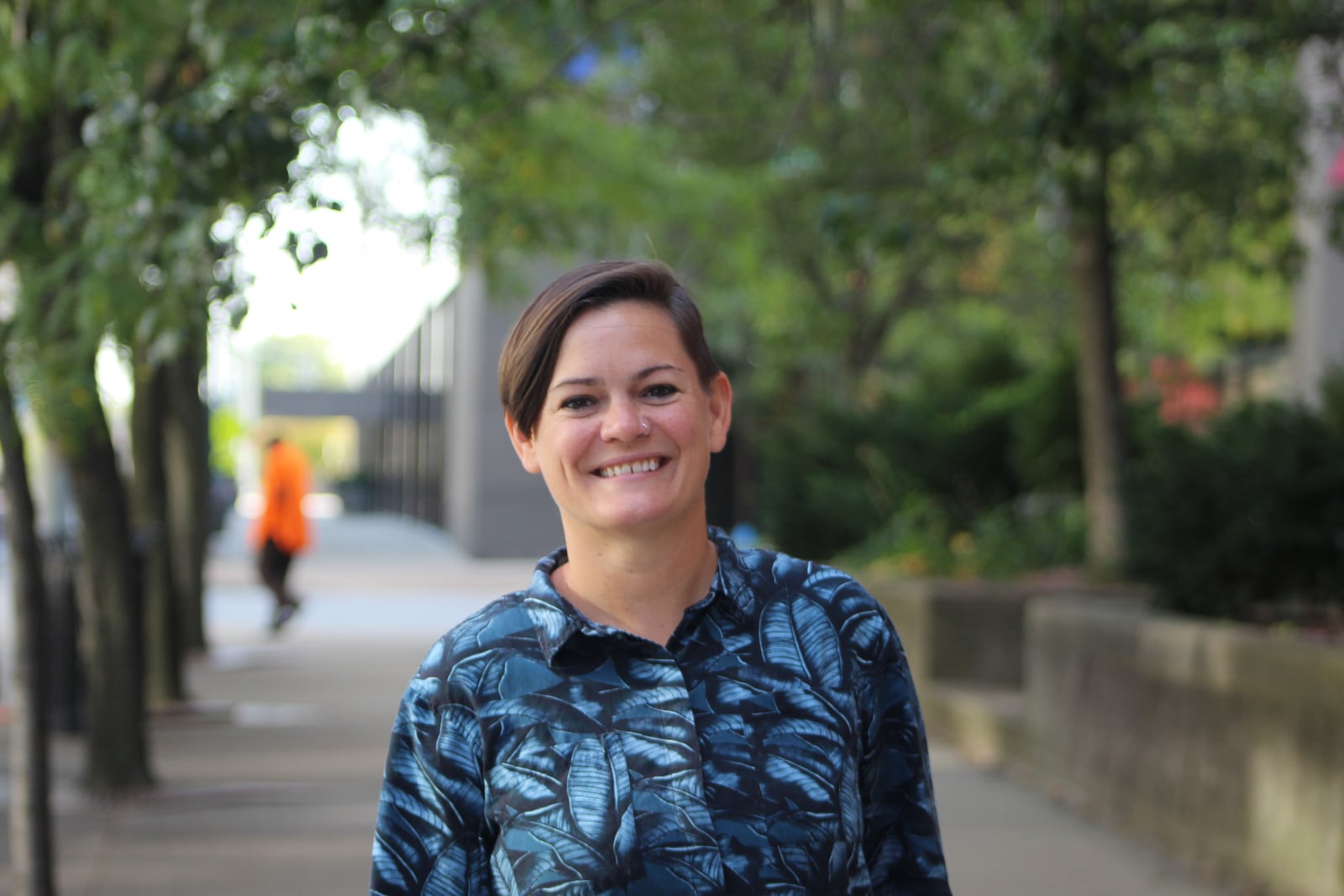 Katie Meyer, the new executive director of the Downtown Dayton Partnership, outside of the partnership's current offices in the Key Bank Tower. CORNELIUS FROLIK / STAFF