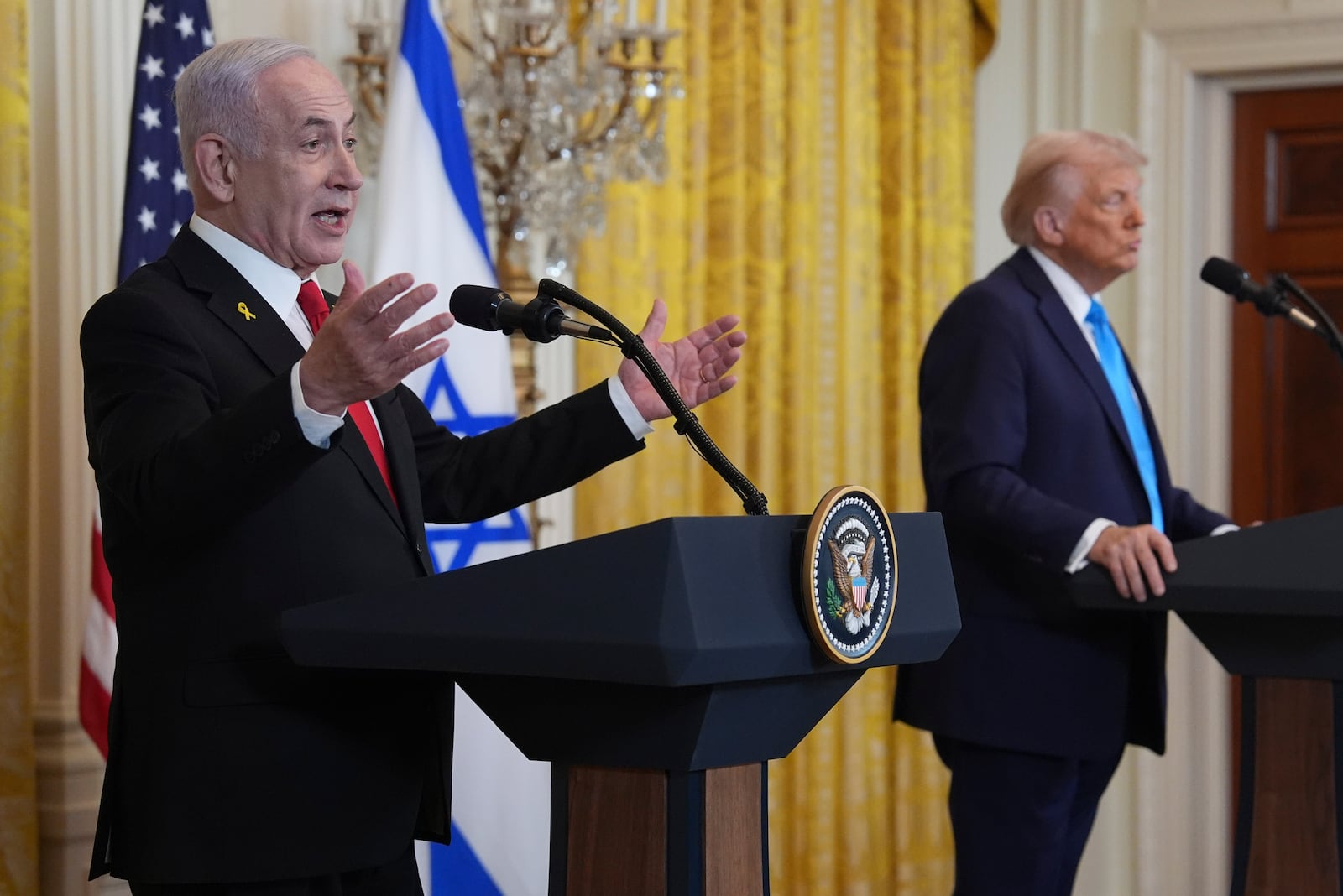 President Donald Trump and Israel's Prime Minister Benjamin Netanyahu participate in a news conference in the East Room of the White House, Tuesday, Feb. 4, 2025, in Washington. (AP Photo/Evan Vucci)