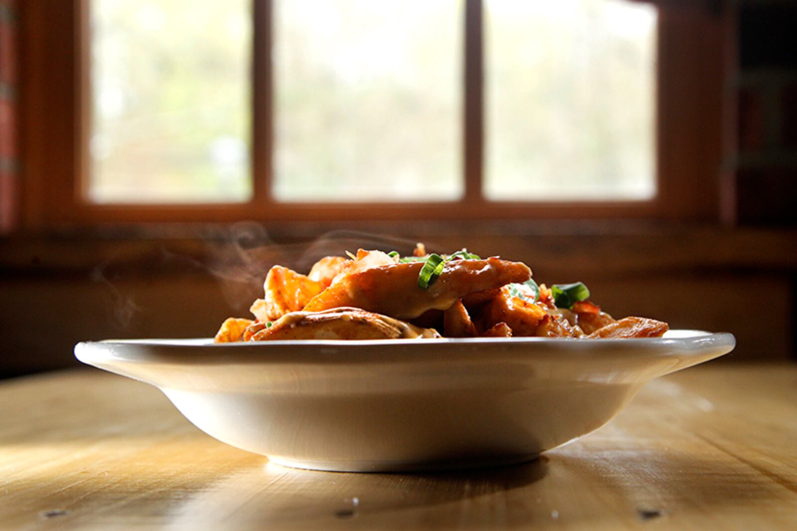 Carillon Brewing Co. Bier Cheese Fries, one of the restaurant's new menu items.