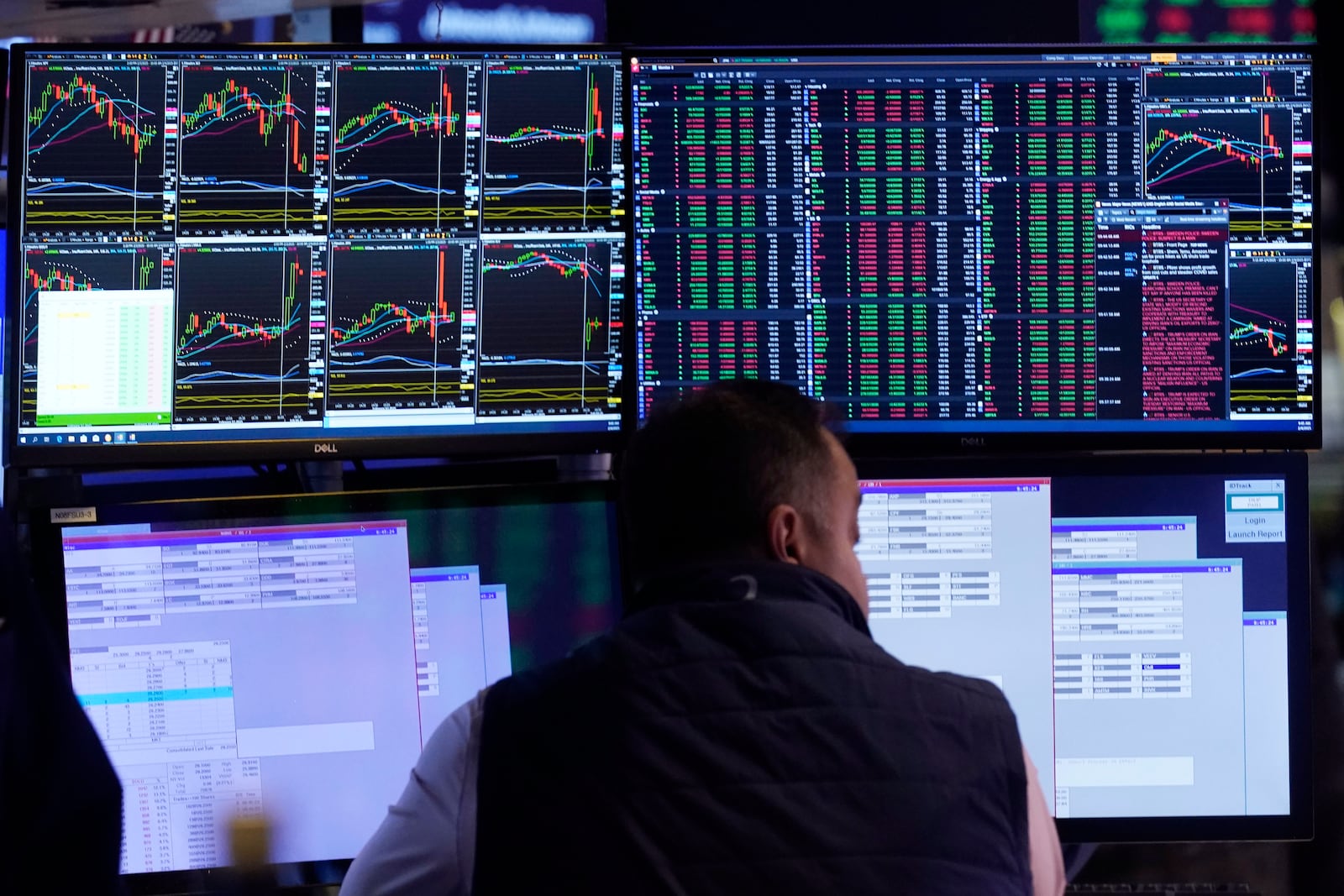 Specialist Dilip Patel works at his post on the floor of the New York Stock Exchange, Tuesday, Feb. 4, 2025. (AP Photo/Richard Drew)