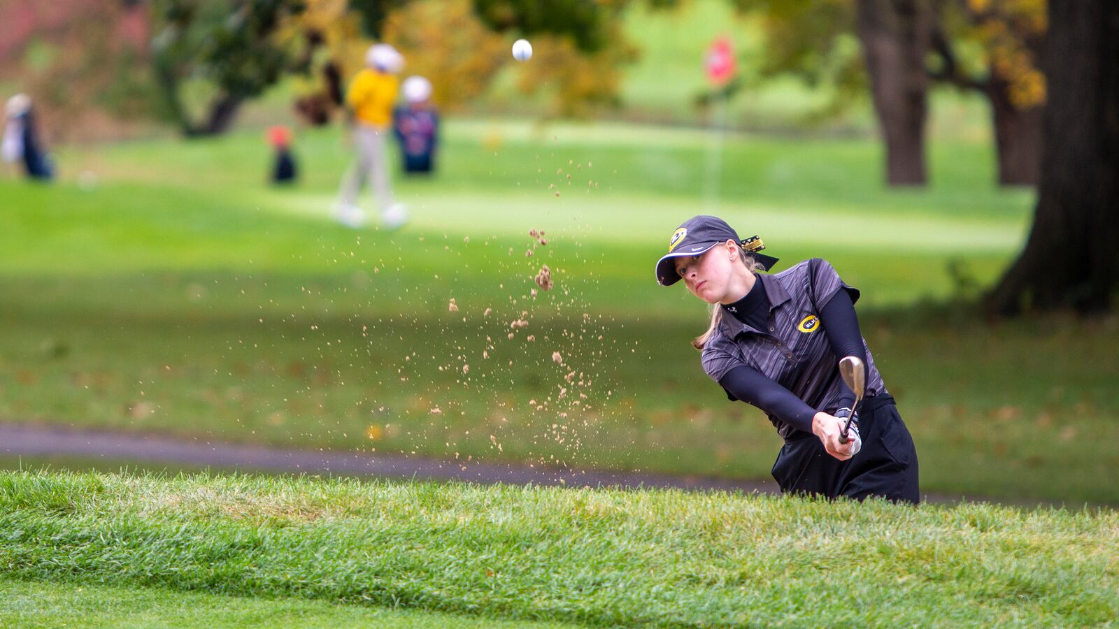 Centerville's Jenna Hayes hits a bunker shot Saturday during the final round of the Division I state girls golf tournament in Columbus. Jeff Gilbert/CONTRIBUTED