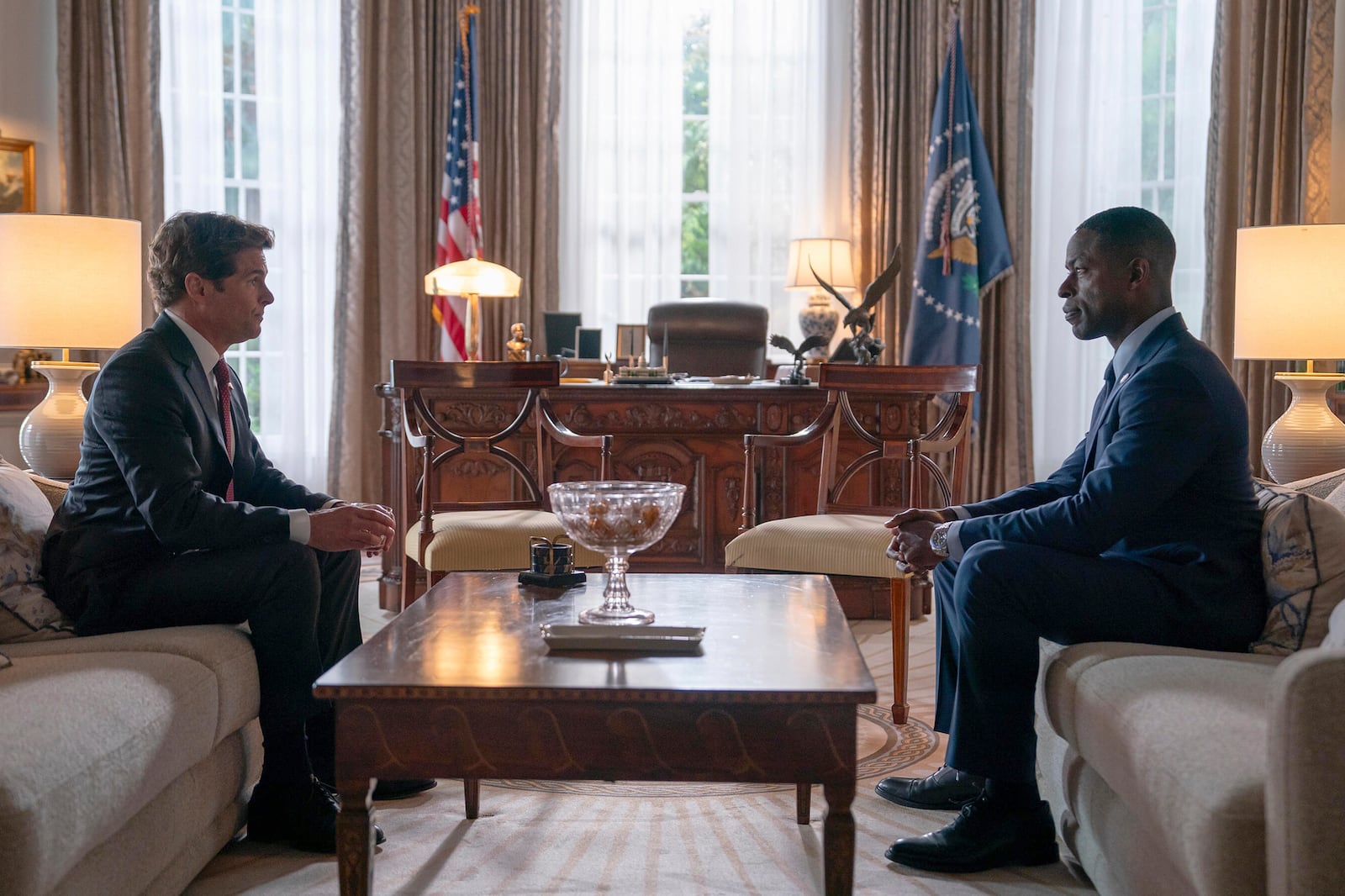 This image released by Disney shows James Marsden, left, and Sterling K. Brown in a scene from "Paradise." (Brian Roedel/Disney via AP)