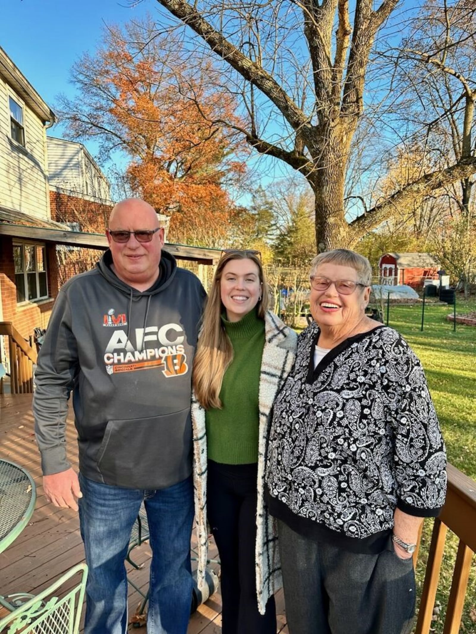 T.J. Justice of Moraine won third place in the Cox First Media tailgate recipe contest for his southern style hot wings. He is pictured with his daughter, Natalie, and his mom, Judy (CONTRIBUTED PHOTO).