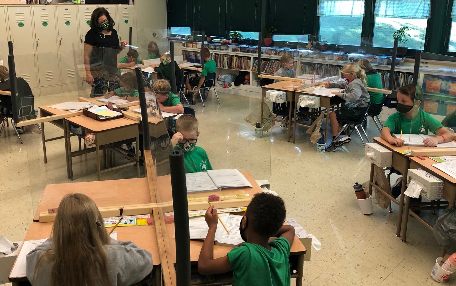 Second-graders in Carol Keating's classroom at St. Brigid's Catholic School in Xenia learn about synonyms Friday, Sept. 25, 2020.