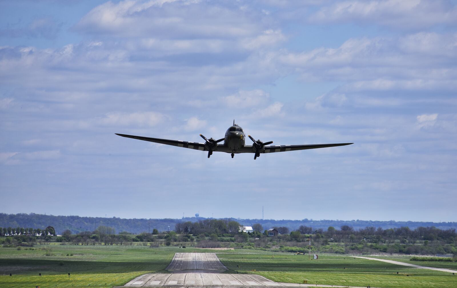 That’s All, Brother, a C-47 piloted by Lt. Col. John Donalson, arrived at Butler County Regional Airport Friday, April 16 for a three-day visit with tours and rides available. The historic WWII C-47 aircraft led over 800 C-47’s over the drop zones of Normandy, France on D-Day on June 6th, 1944. NICK GRAHAM / STAFF