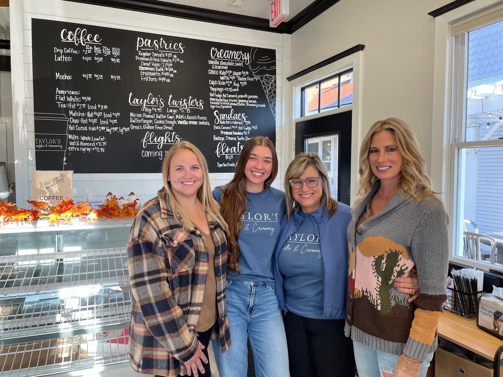 Taylor’s Coffee & Creamery, a one-stop shop for coffee, donuts, basked goods and ice cream, is opening soon at 195 S. Main St. in downtown Waynesville. Pictured (left to right) is owner Julie Abel, store manager Taylor Ritter, owner Angie Wagner and owner Jona Powell.  NATALIE JONES/STAFF