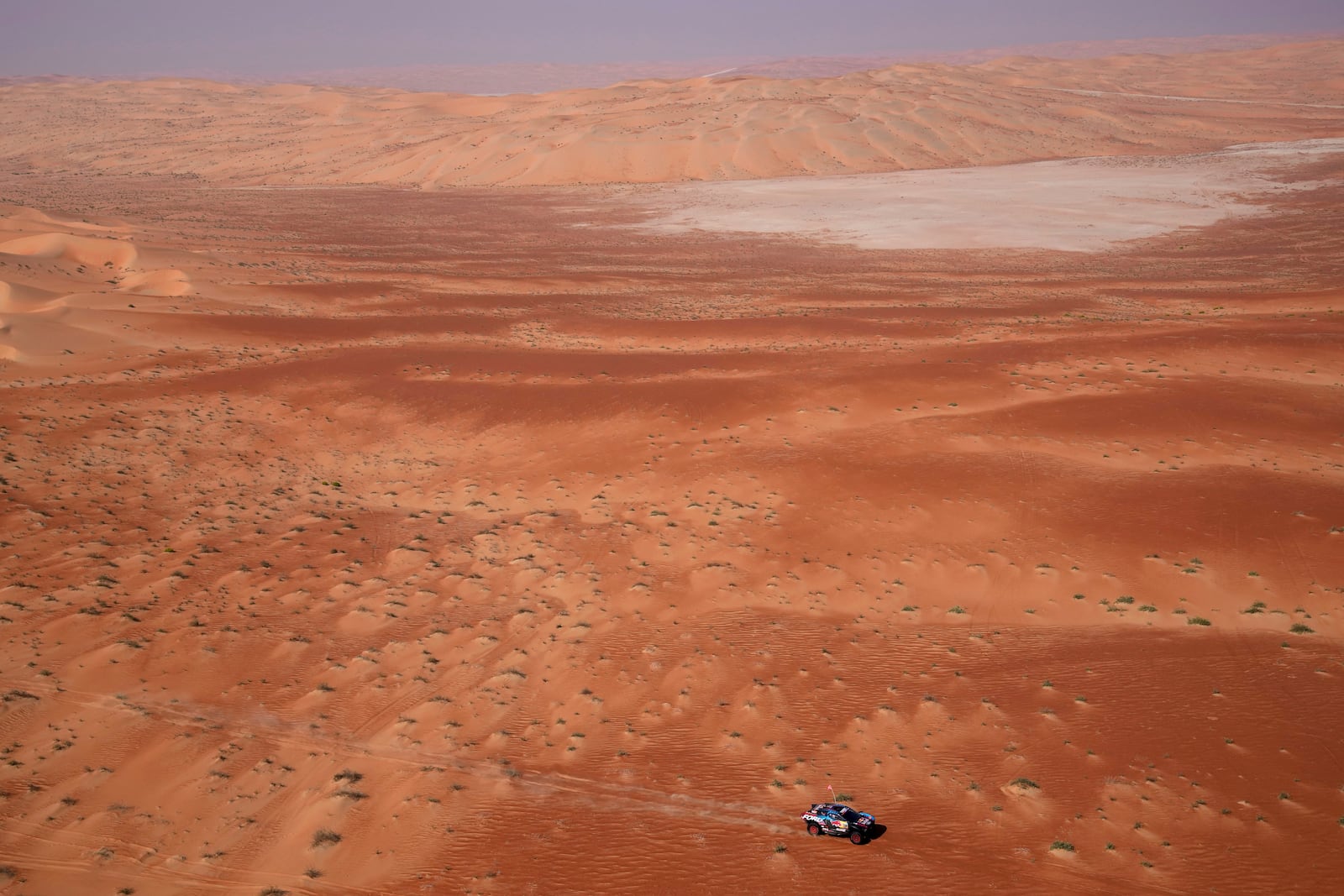 Mitchell Guthrie and co-driver Kellon Walch compete during the tenth stage of the Dakar Rally between Haradh and Shubaytah, Saudi Arabia, Wednesday, Jan. 15, 2025. (AP Photo/Christophe Ena)