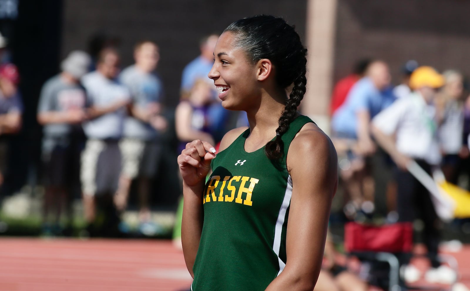 Catholic Central's Mallory Mullen smiles after clinching a victory in the high jump in the Division III state track championship on Friday, June 3, 2022, at Jesse Owens Memorial Stadium in Columbus. David Jablonski/Staff