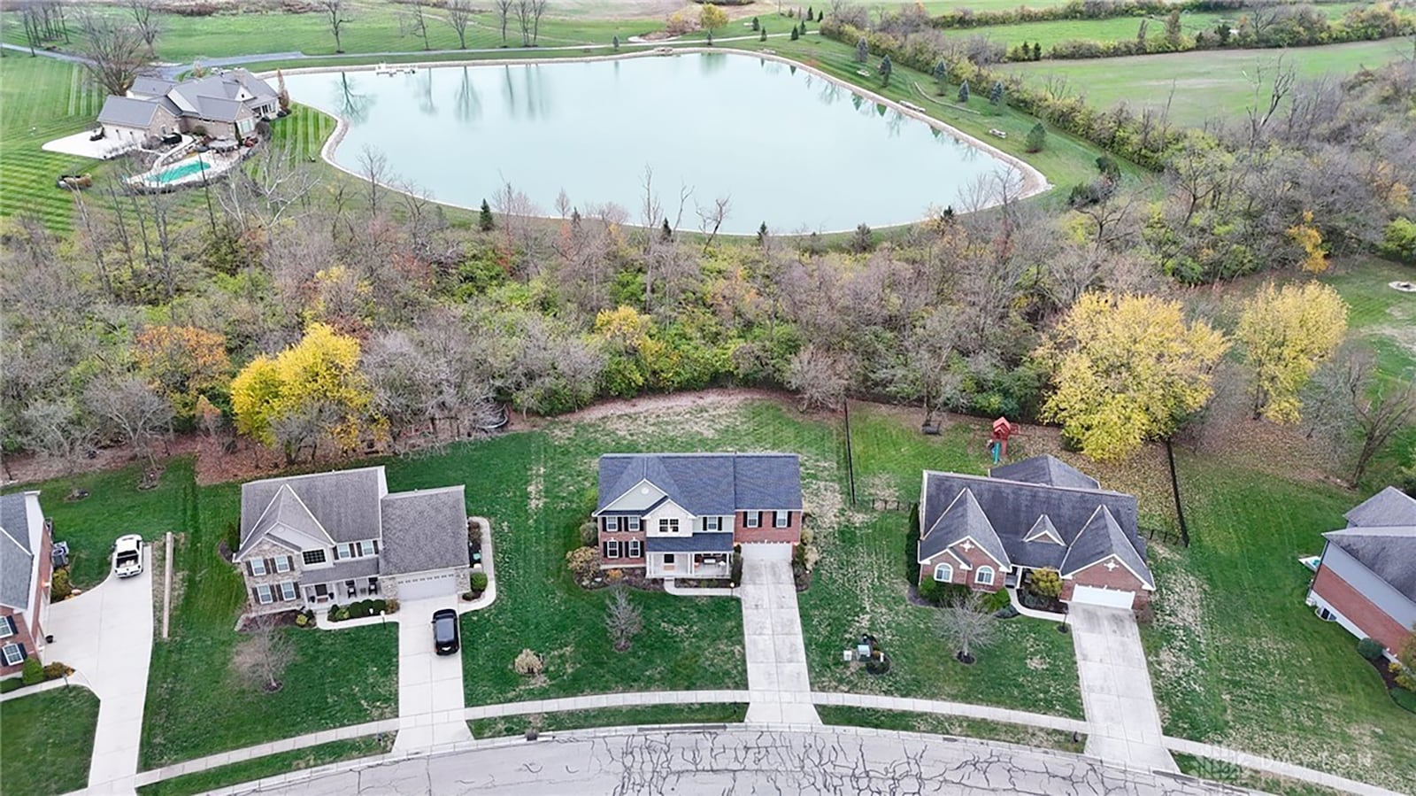 The 3,808 square foot home in Centerville has a tree lined back yard with a lake on the other side.