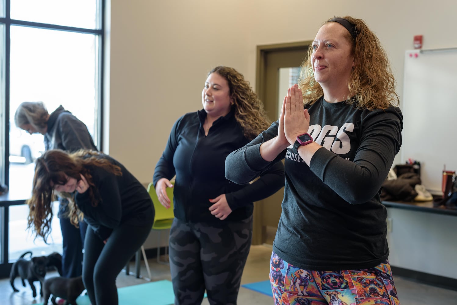 PHOTOS: Puppy Yoga at SICSA Pet Adoption and Wellness Center