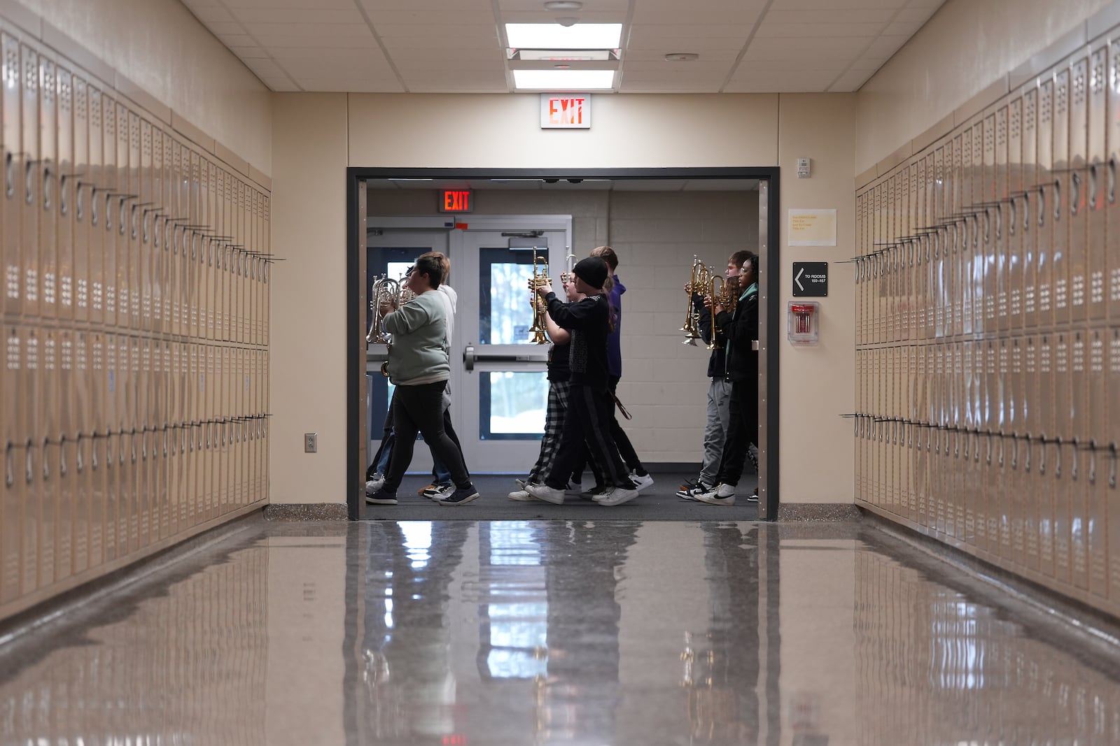 Students in the Middletown High School band practice marching in the hallways of the school, Tuesday, Jan. 14, 2025, in Middletown, Ohio. The band is set to participate in the inauguration of President-elect Donald Trump on Jan. 20. Middletown is the hometown of Vice President-elect JD Vance. (AP Photo/Kareem Elgazzar)