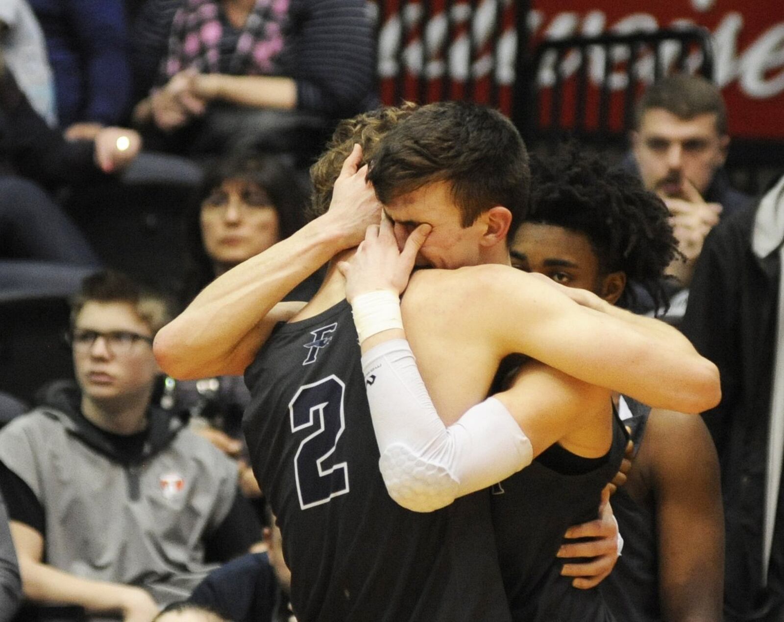 It was an emotional end of the season for many reasons to Fairmont senior leaders Kellan Bochenek (left) and Ryan Hall. MARC PENDLETON / STAFF