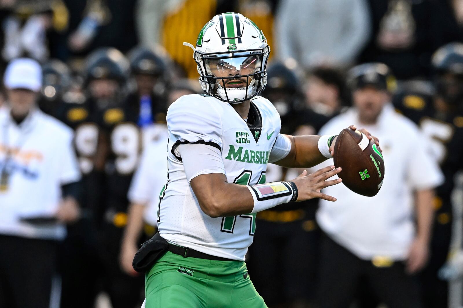 Marshall quarterback Cam Fancher drops back to pass during the first half of the team's NCAA college football game against Appalachian State on Saturday, Nov. 4, 2023, in Boone, N.C. (AP Photo/Matt Kelley)