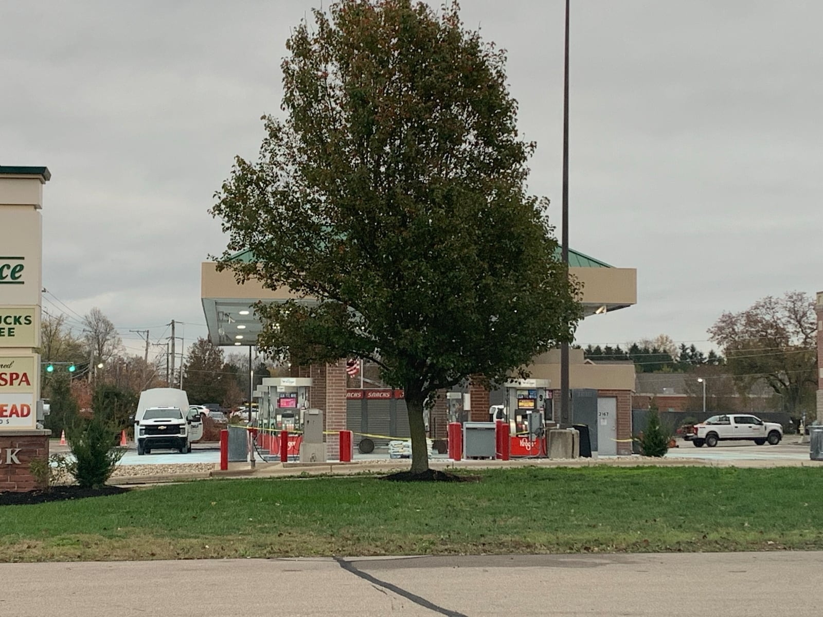 Crews clean up after a gas station fire at the Kroger on Dayton Xenia Road in Beavercreek. LONDON BISHOP/STAFF