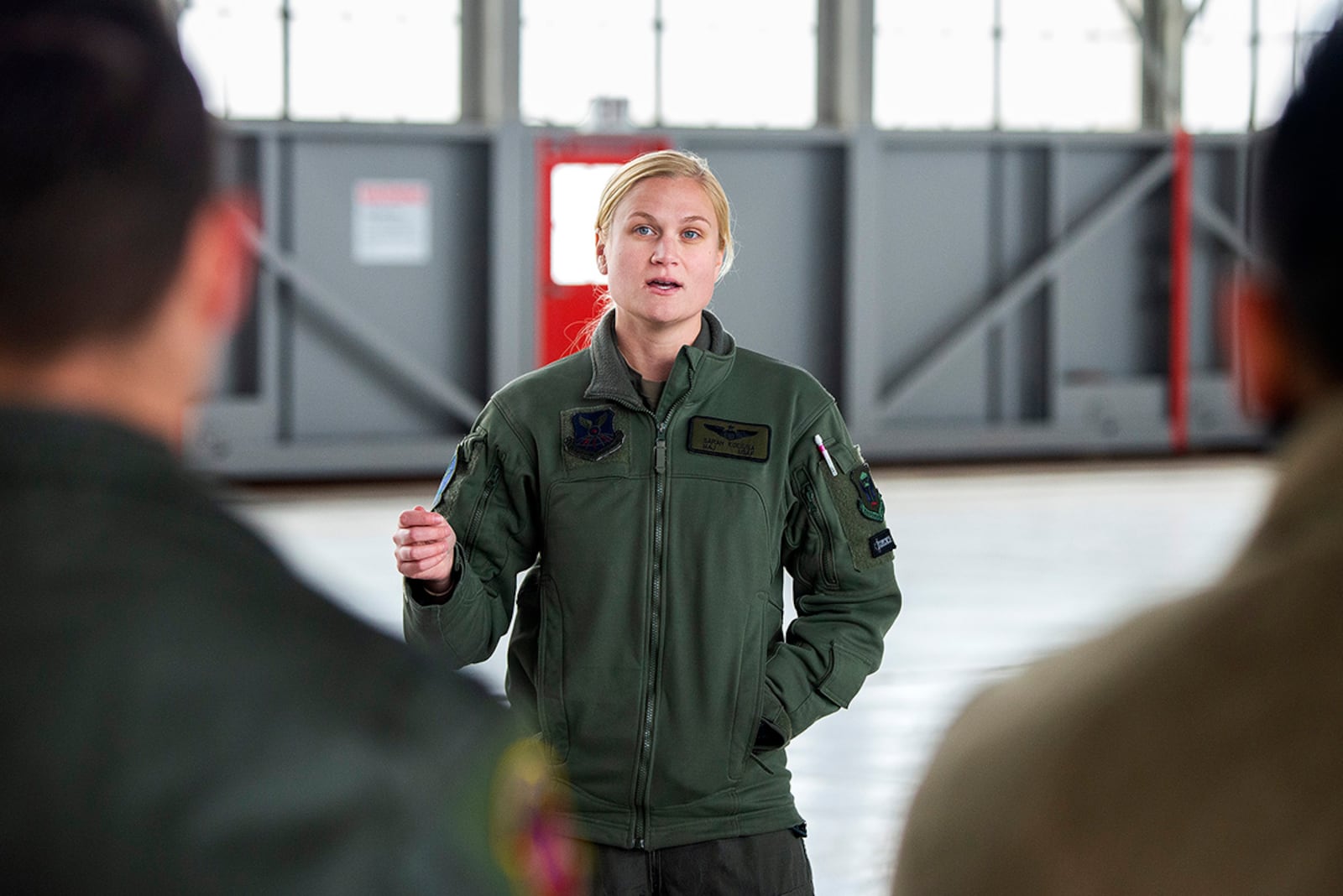 Maj. Sarah Kociuba, 393rd Bomb Squadron pilot, visits with Air Force ROTC cadets of Detachment 643 on Nov. 15 in a hangar at Wright-Patterson Air Force Base. U.S. AIR FORCE PHOTO/R.J. ORIEZ