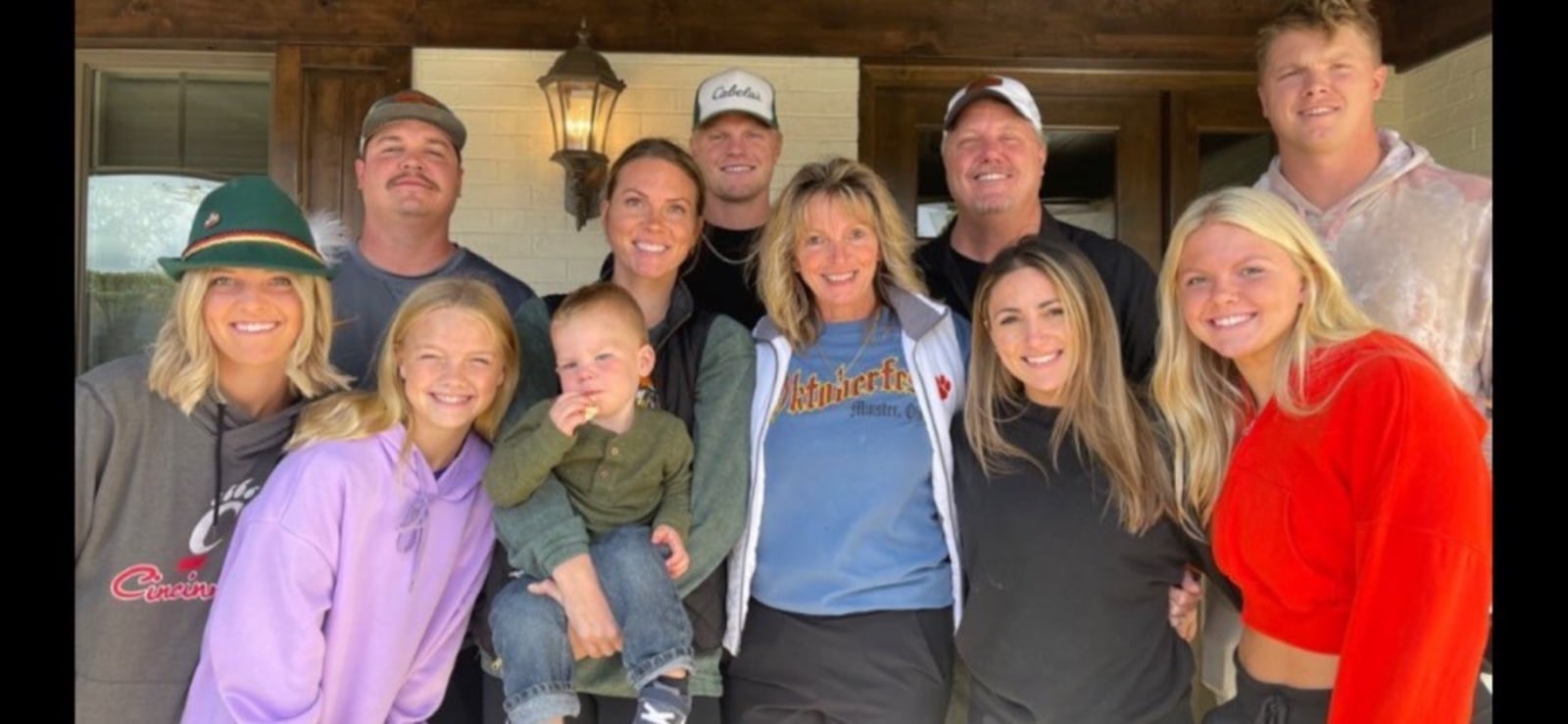 The Wolf family from left: Demaris (daughter), Scott Lammers (son in law), Charley (daughter), Delanie (daughter) holding her 2 year old son Zeke, Eli (son), Shelly, James, Brooke Kelley (Ethan’s girlfriend), Ivy (daughter) and  Ethan (son)