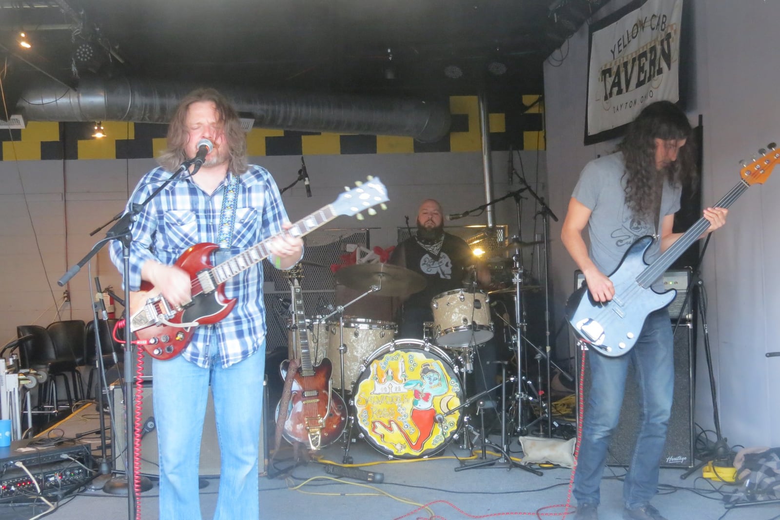 Kyle Byrum (left) and his band Salvadore Ross in the first social distancing show of the season at Yellow Cab Tavern’s outdoor Food Truck Hub on Friday, May 15. CONTRIBUTED/DON THRASHER