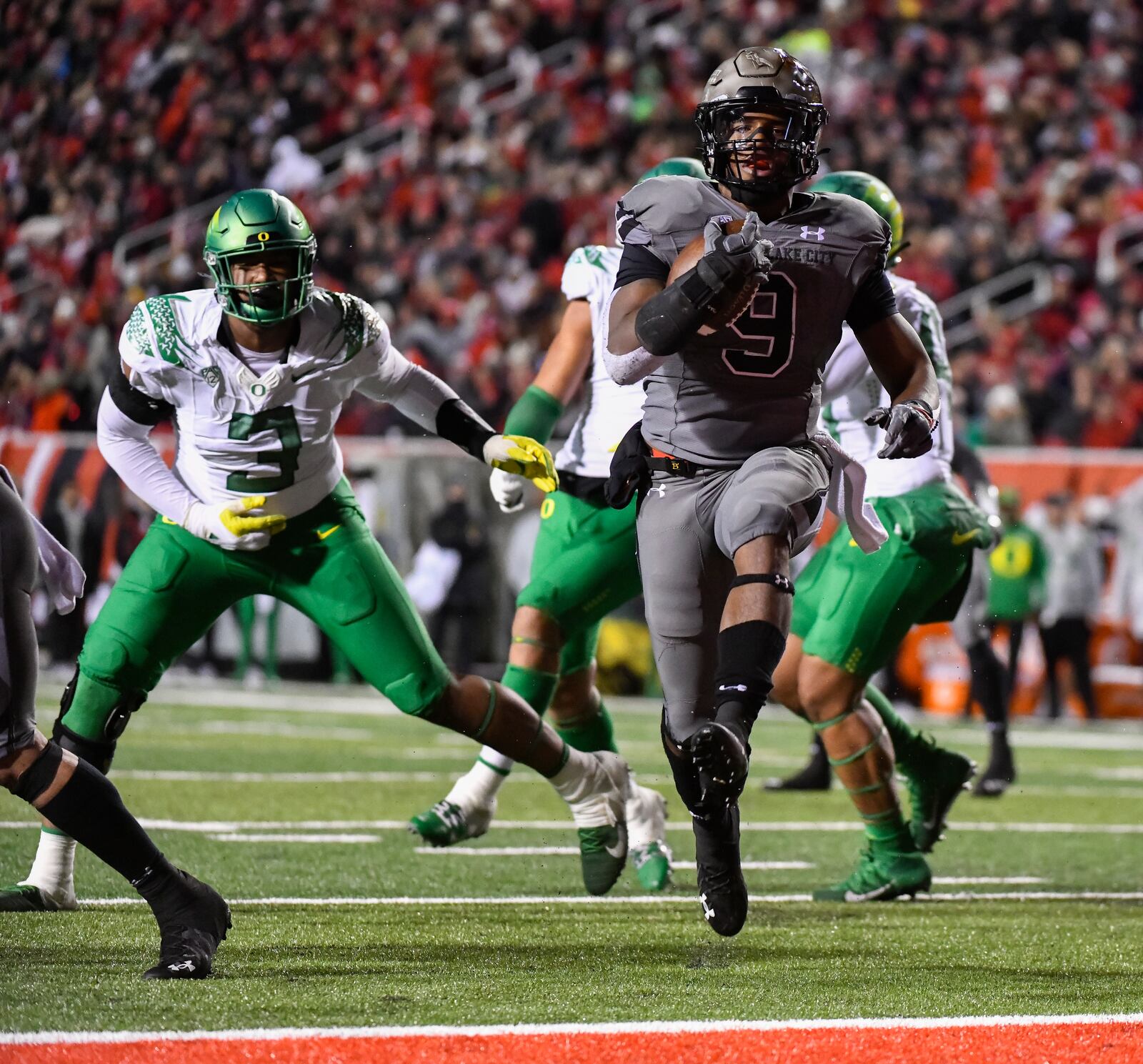 Utah running back Tavion Thomas (9) runs into the end zone during the second half of an NCAA college football game against Oregon Saturday, Nov. 20, 2021, in Salt Lake City. (AP Photo/Alex Goodlett)