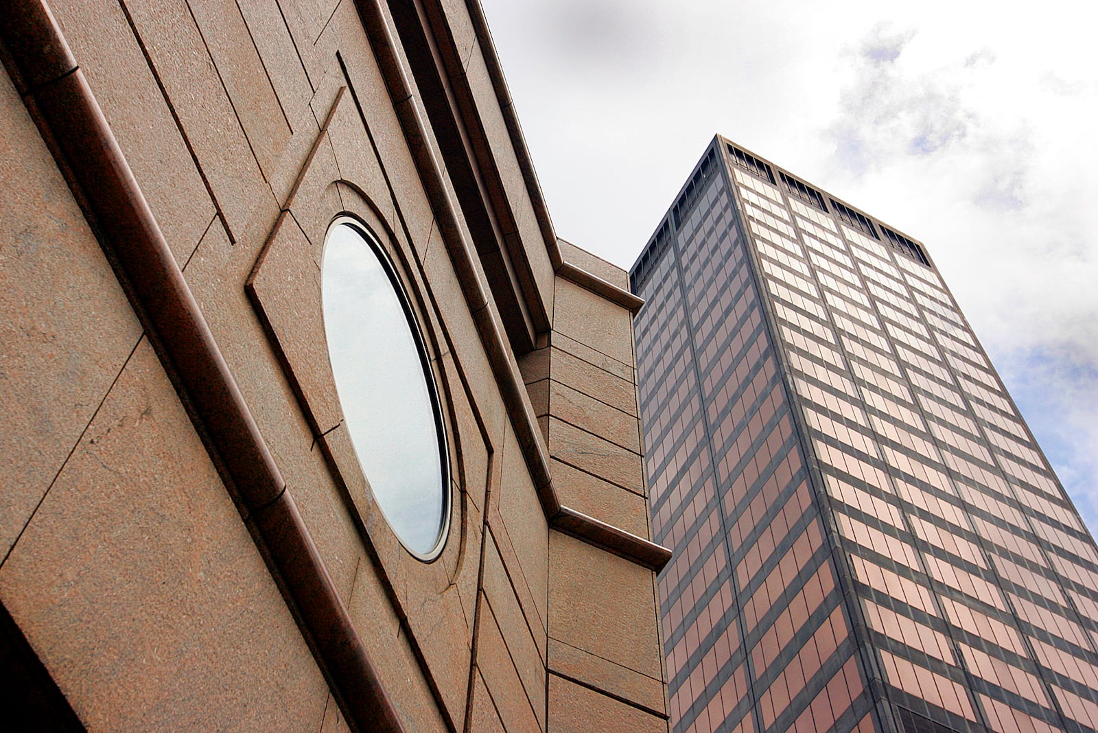 The building at 110 N. Main St. (foreground) and the Kettering Tower (background) both have court-appointed receivers operating them. Staff photo by Jim Witmer