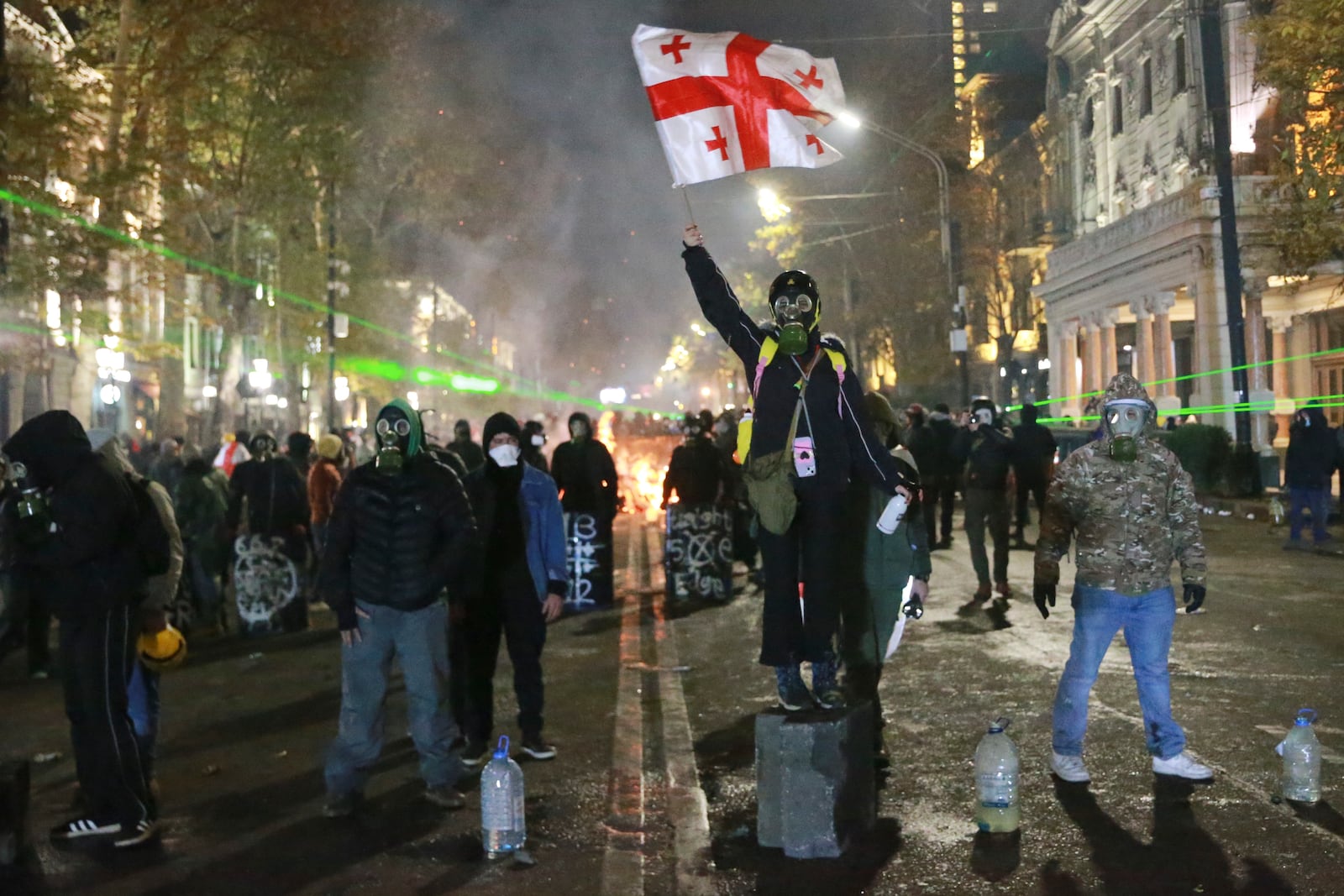 Demonstrators participate a rally to protest against the government's decision to suspend negotiations on joining the European Union in Tbilisi, Georgia, early Wednesday, Dec. 4, 2024. (AP Photo/Zurab Tsertsvadze)