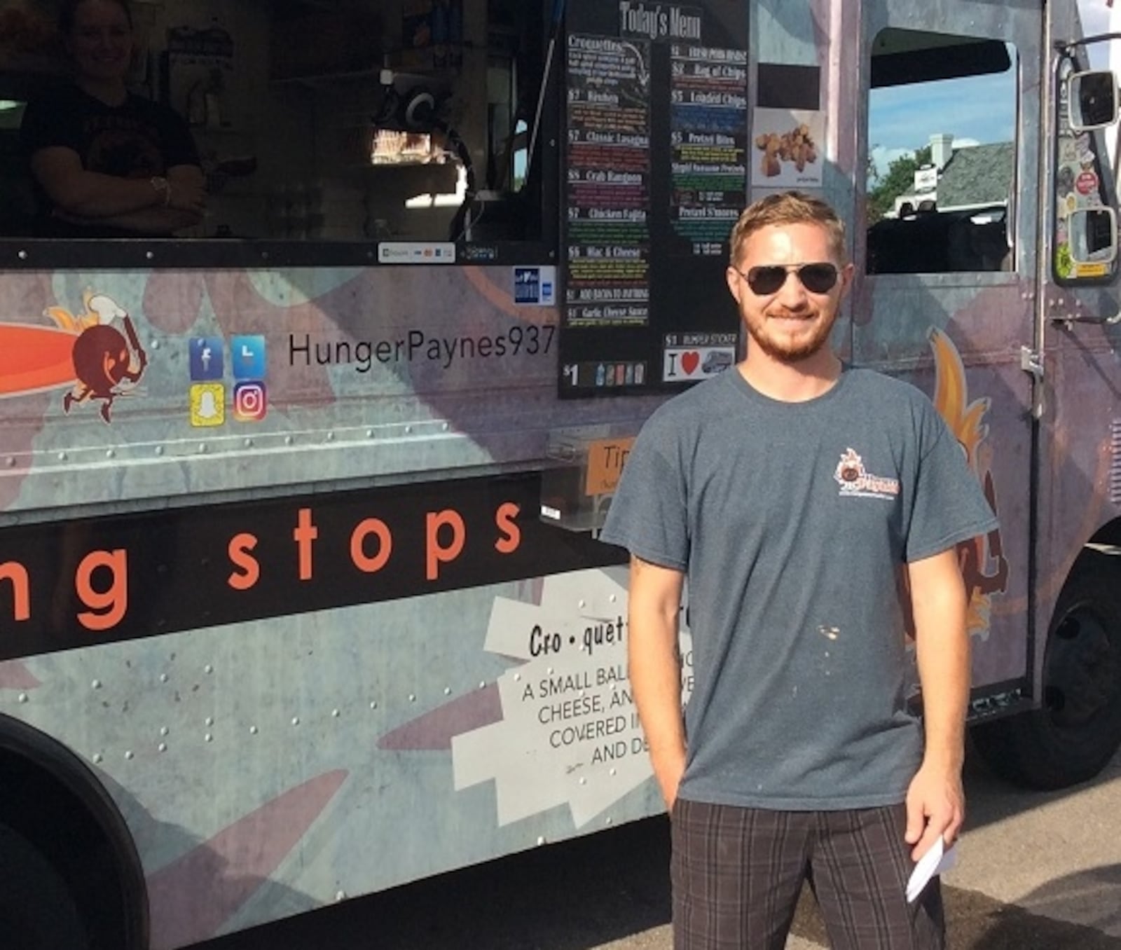 Andrew Payne, founder of Hunger Paynes, at a food truck rally in downtown Centerville. File photo by MARK FISHER/STAFF