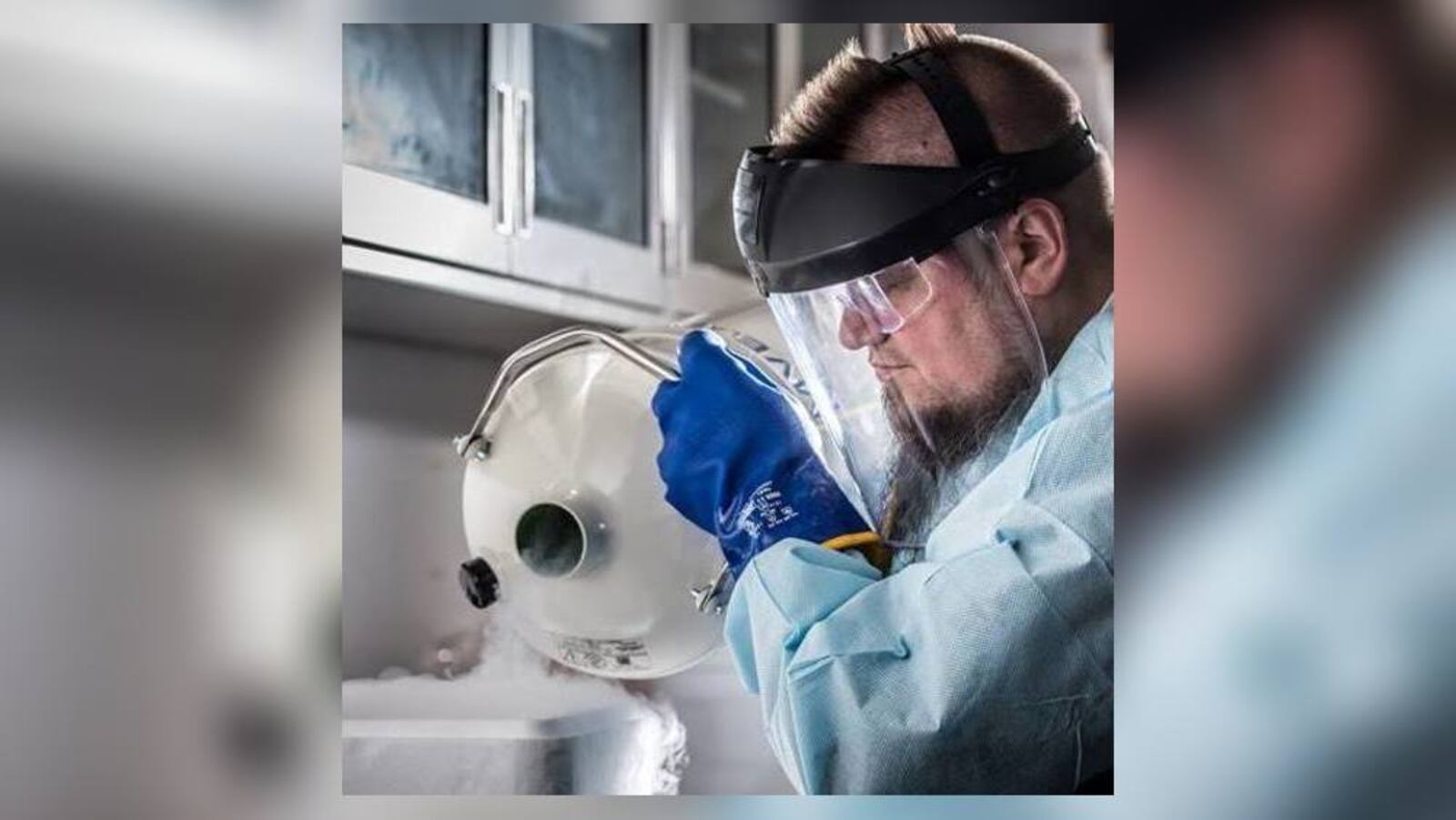 Luis Estevez, owner of AIMM in Dayton, pours liquid nitrogen as part of a chemistry experiment.