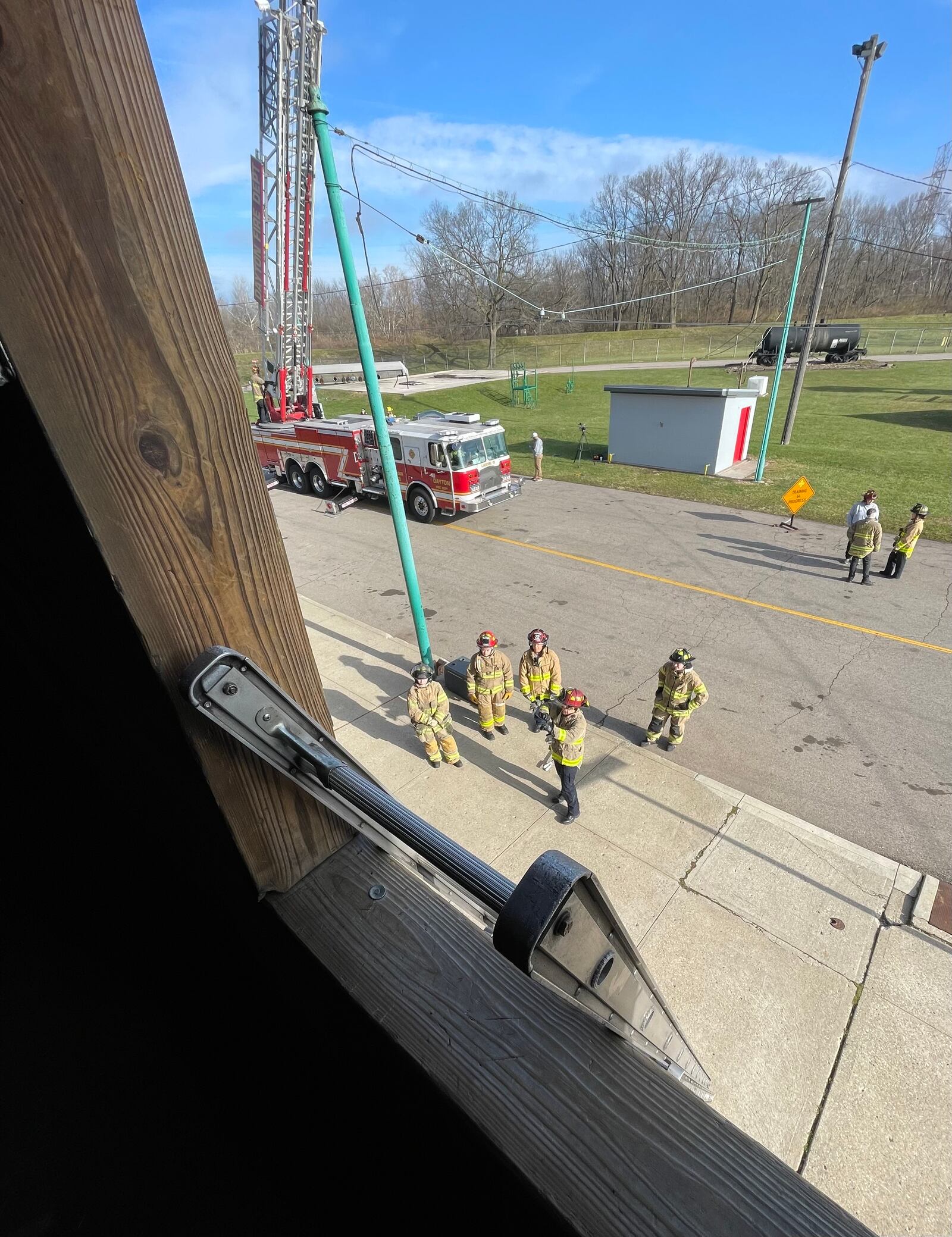 Participants at the Dayton Fire Department's Fire Camp for Women participated in seven different training stations where they practiced procedures like EMS response, aerial and ground ladder climbing, hose movement, forcible entry, and search and rescue. AIMEE HANCOCK/STAFF