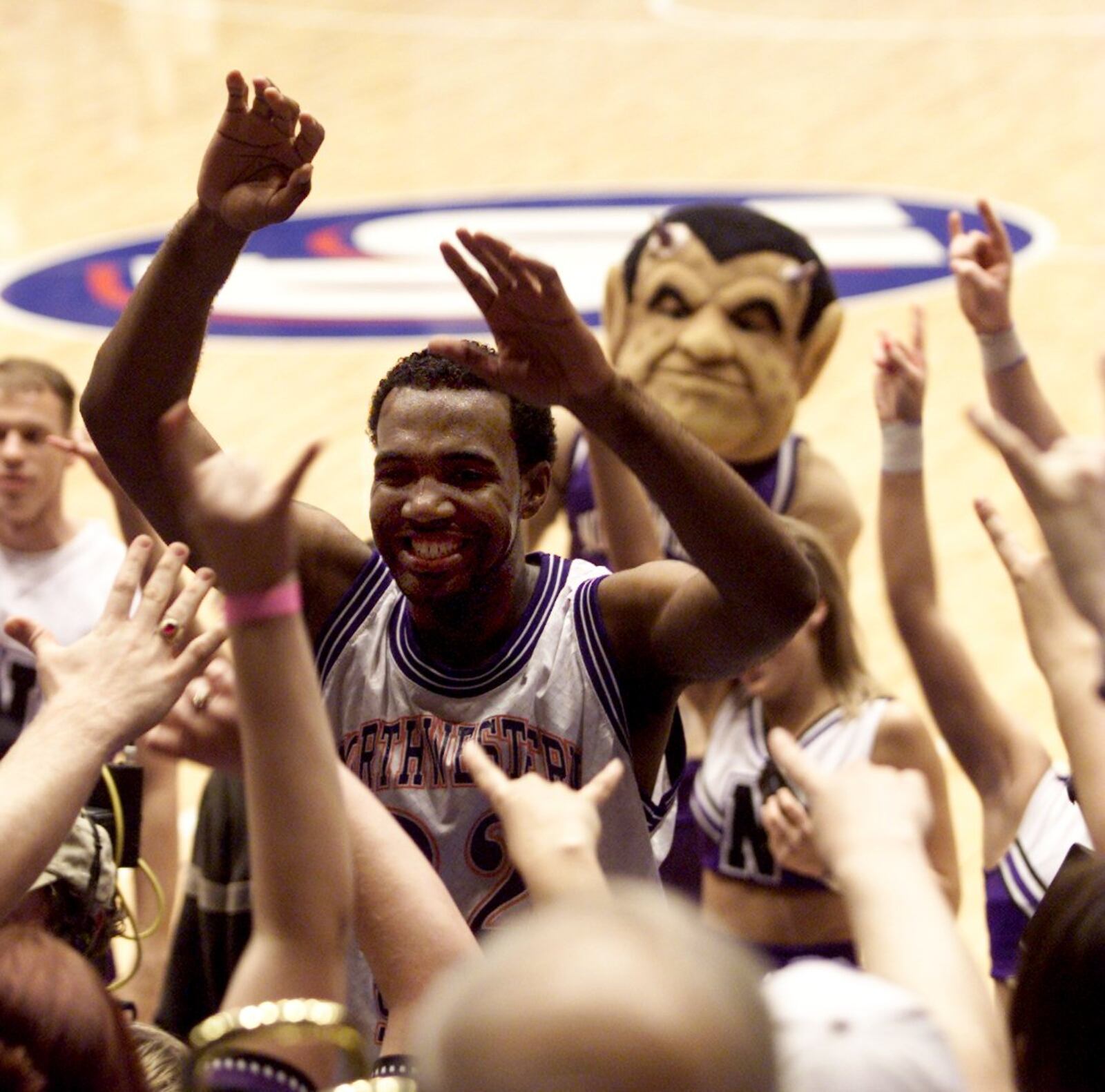 Northwestern State's Chris Lynch celebrates after a victory in the NCAA tournament at UD Arena in 2001. Lisa Powell/Staff