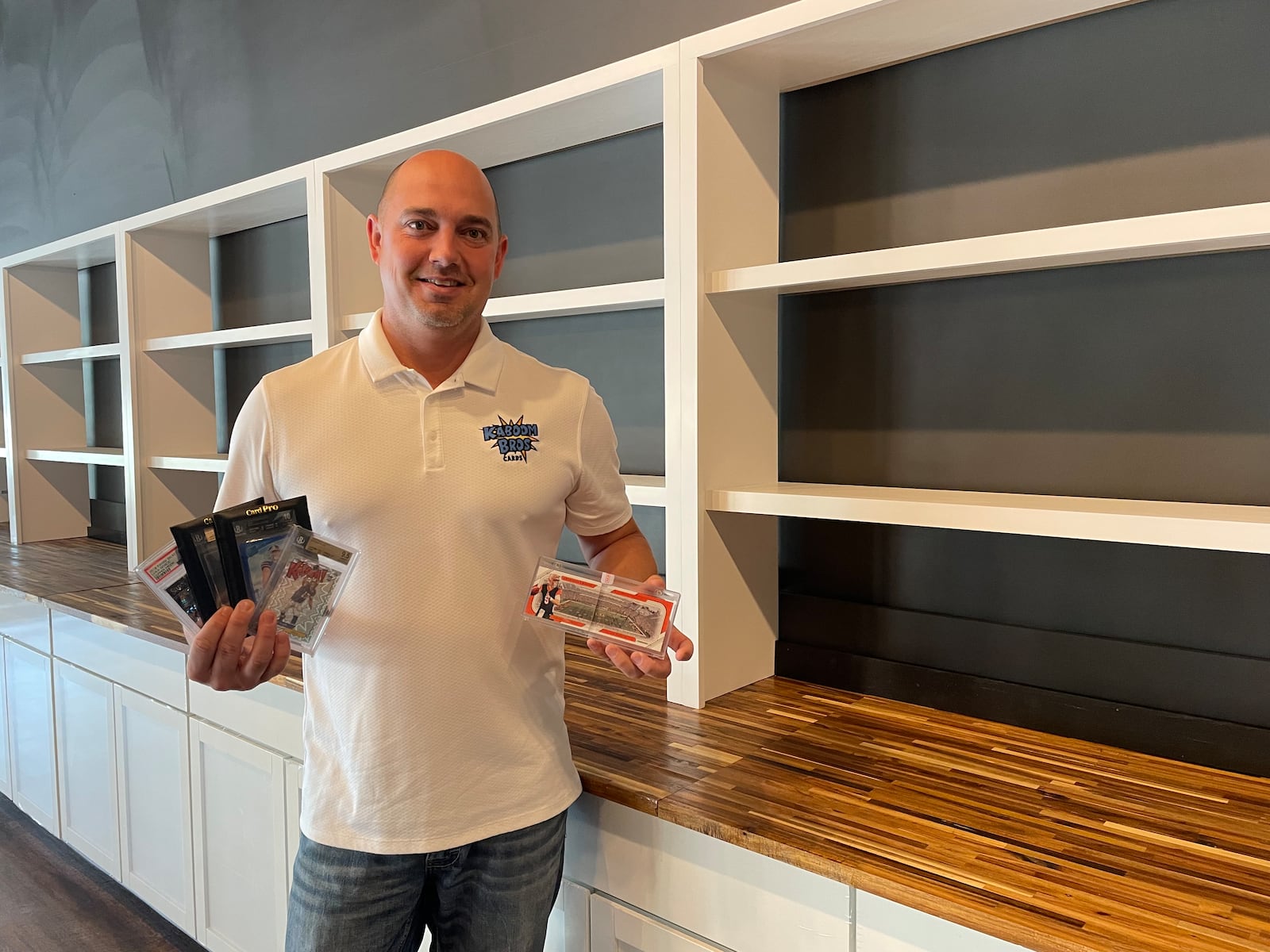 Park Grille & Bar, a casual, family-friendly restaurant with sport cards and memorabilia, is set to open at Austin Landing by the end of this month. Pictured is Chris Carter, co-owner of Park Grille & Bar.